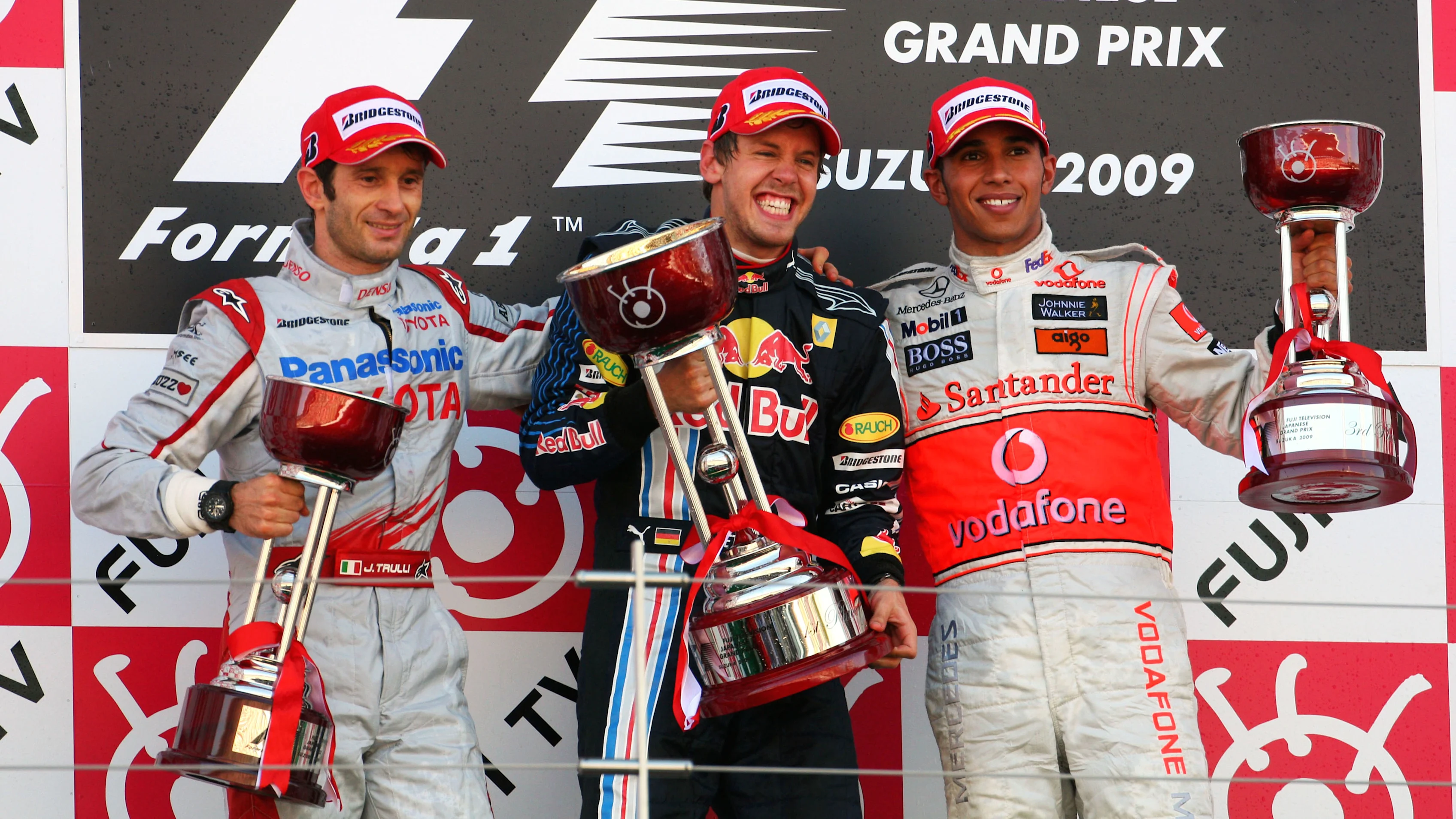 The podium (L to R): Jarno Trulli (ITA) Toyota, second; Sebastian Vettel (GER) Red Bull Racing,