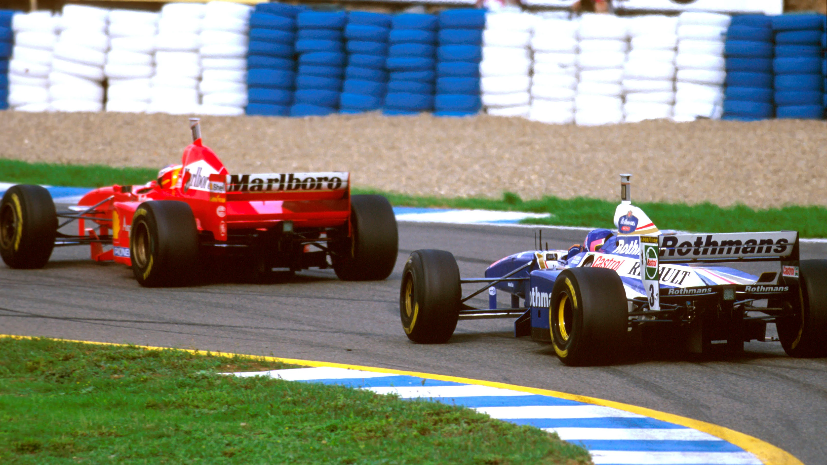 Jerez, Spain.
24-26 October 1997.
Jacques Villeneuve (Williams FW19 Renault) following Michael