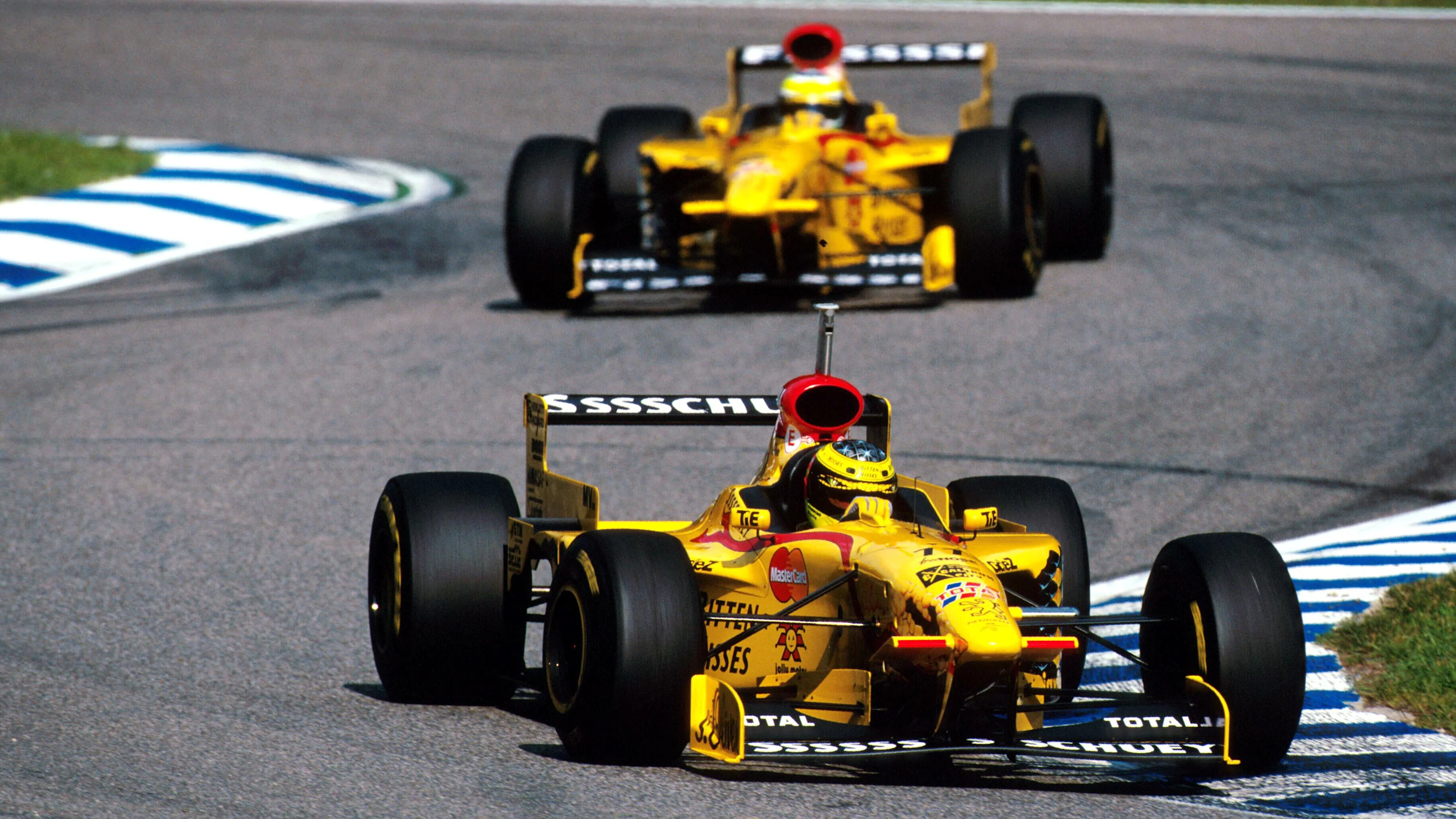 Ralf Schumacher (GER) Jordan 197, 5th place  leads his team mate Giancarlo Fisichella (ITA) Jordan, German Grand Prix, Hockenheim, Germany, 27 July 1997. © Sutton Motorsport Images