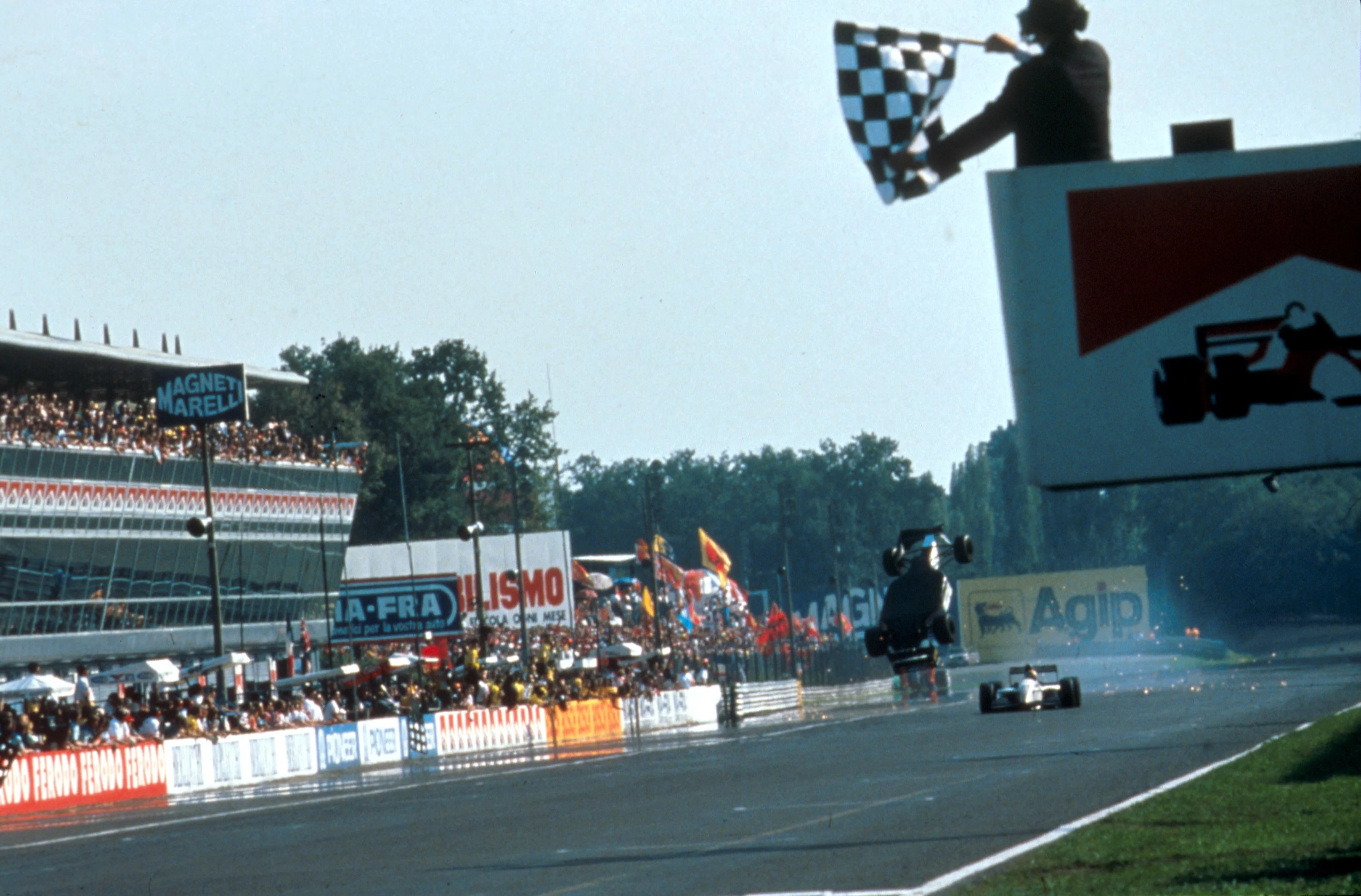The Minardi Ford of Christian Fittipaldi (BRA) is launched  over his team mate Pierluigi Martini (ITA) at the end of the race. Fittipaldi landed right side up and crossed the finish line.
Italian Grand Prix, Monza, Italy, 12 September 1993.