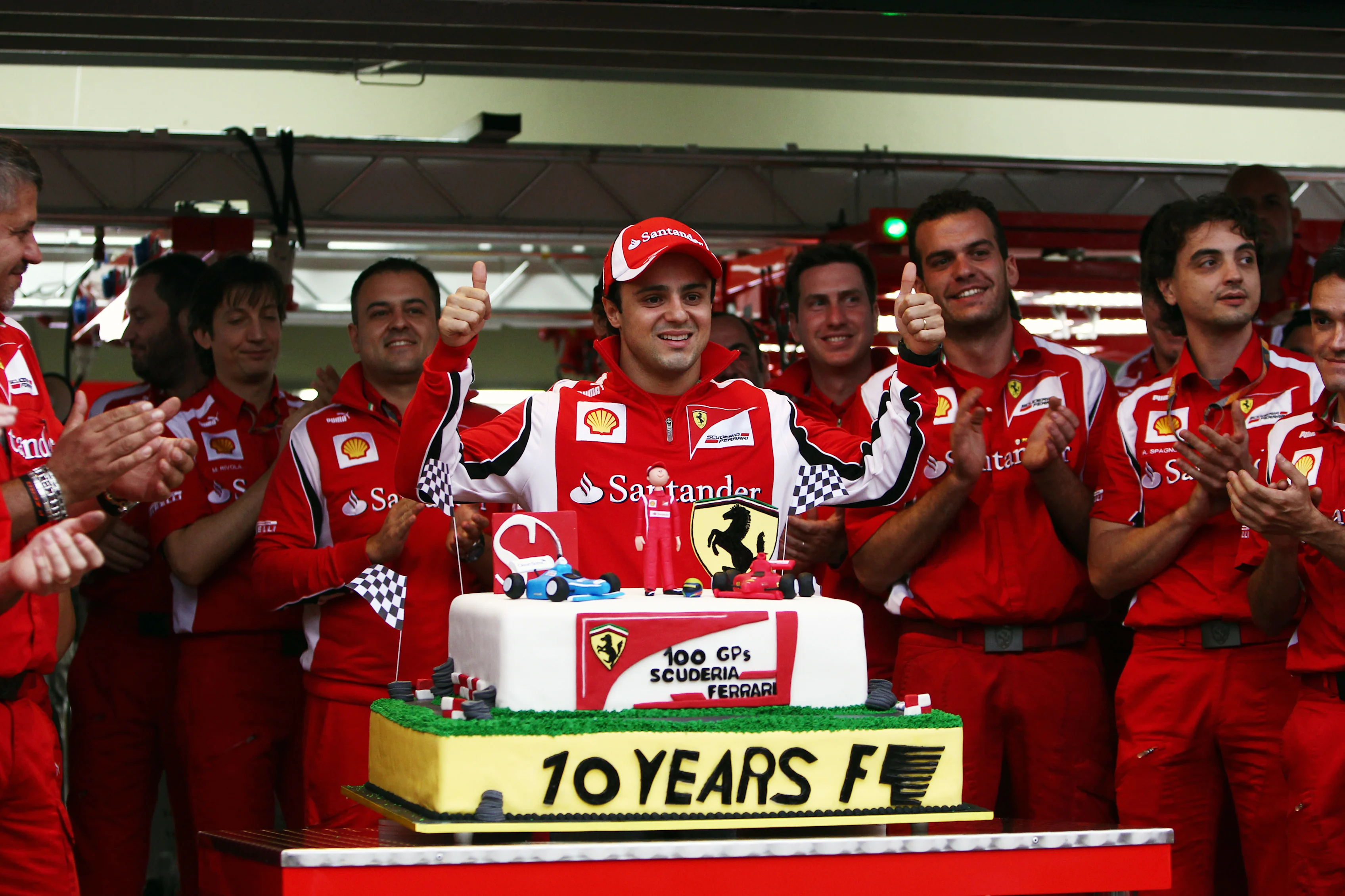 Ferrari celebrate 100 GPs and 10 years with the team for Felipe Massa (BRA) Ferrari.
Formula One World Championship, Rd 19, Brazilian Grand Prix, Qualifying Day, Interlagos, Sao Paulo, Brazil, Saturday 26 November 2011. 
 © © Sutton Motorsport Images