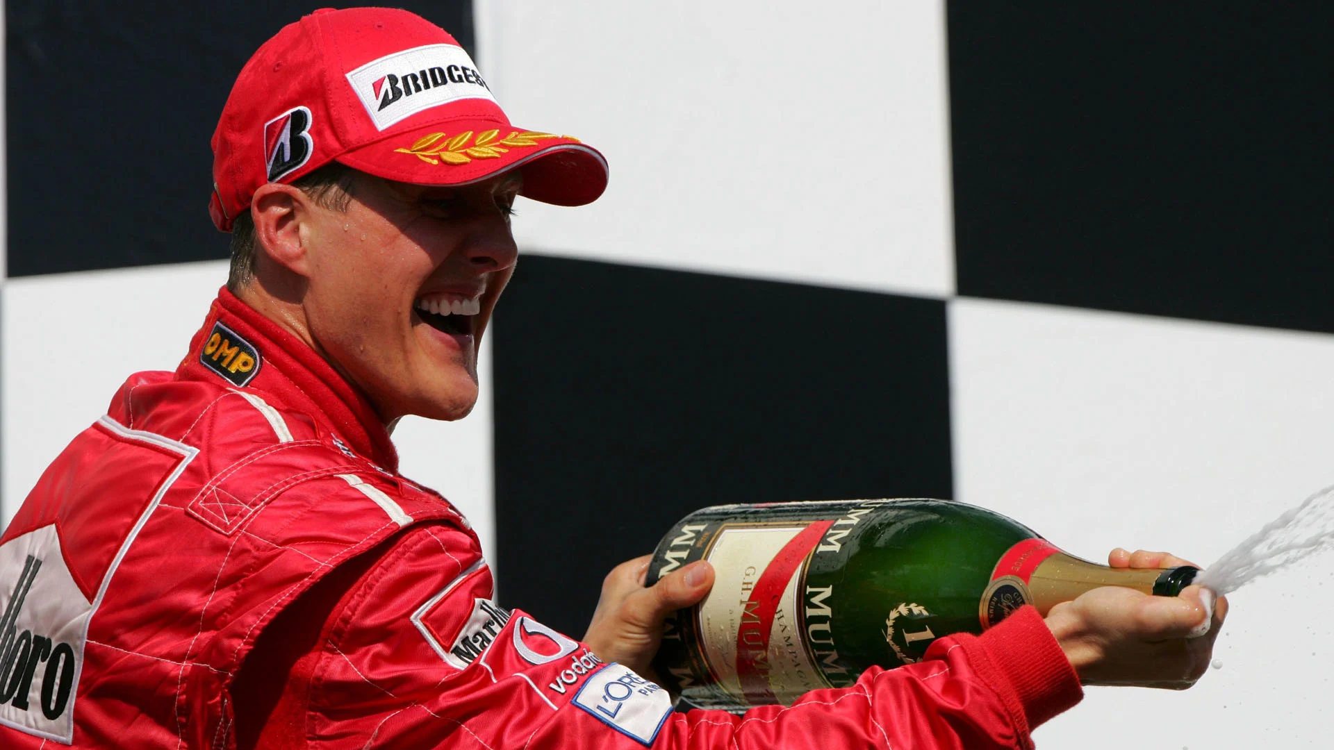Race winner Michael Schumacher (GER) Ferrari on the podium.  Formula One World Championship,