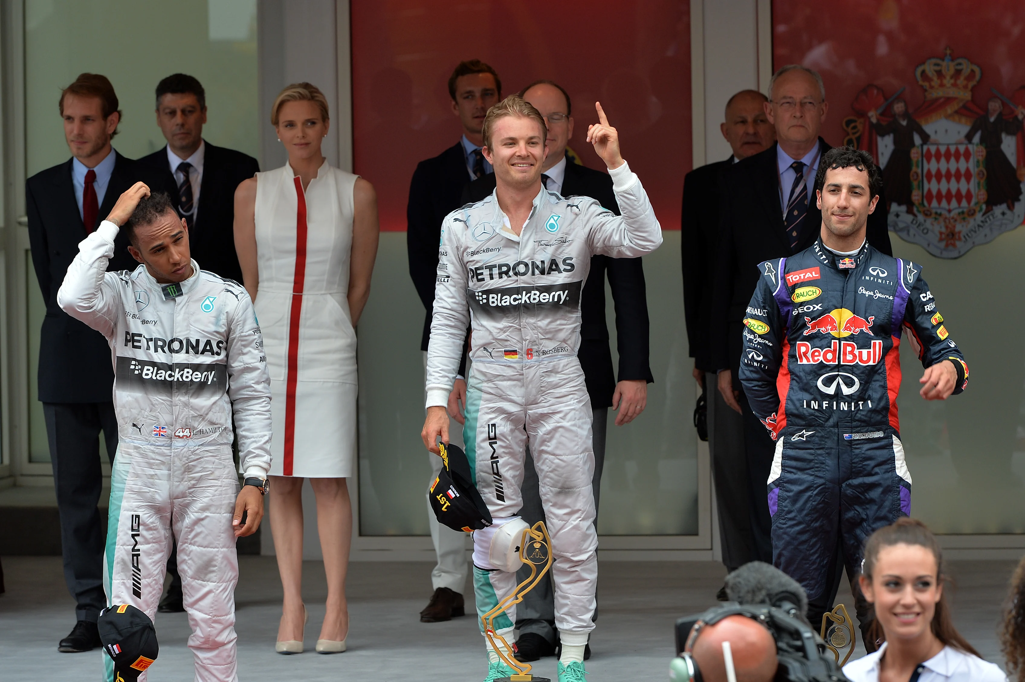 Podium and results:
1st Nico Rosberg (GER) Mercedes AMG F1, centre.
2nd Lewis Hamilton (GBR) Mercedes AMG F1, left.
3rd Daniel Ricciardo (AUS) Red Bull Racing, right.
HSH Prince Albert of Monaco (MON) and his wife SAS Princess Charlene (RSA) are in the background.
Formula One World Championship, Rd6, Monaco Grand Prix, Race, Monte-Carlo, Monaco, Sunday 25 May 2014. © Sutton Motorsport Images