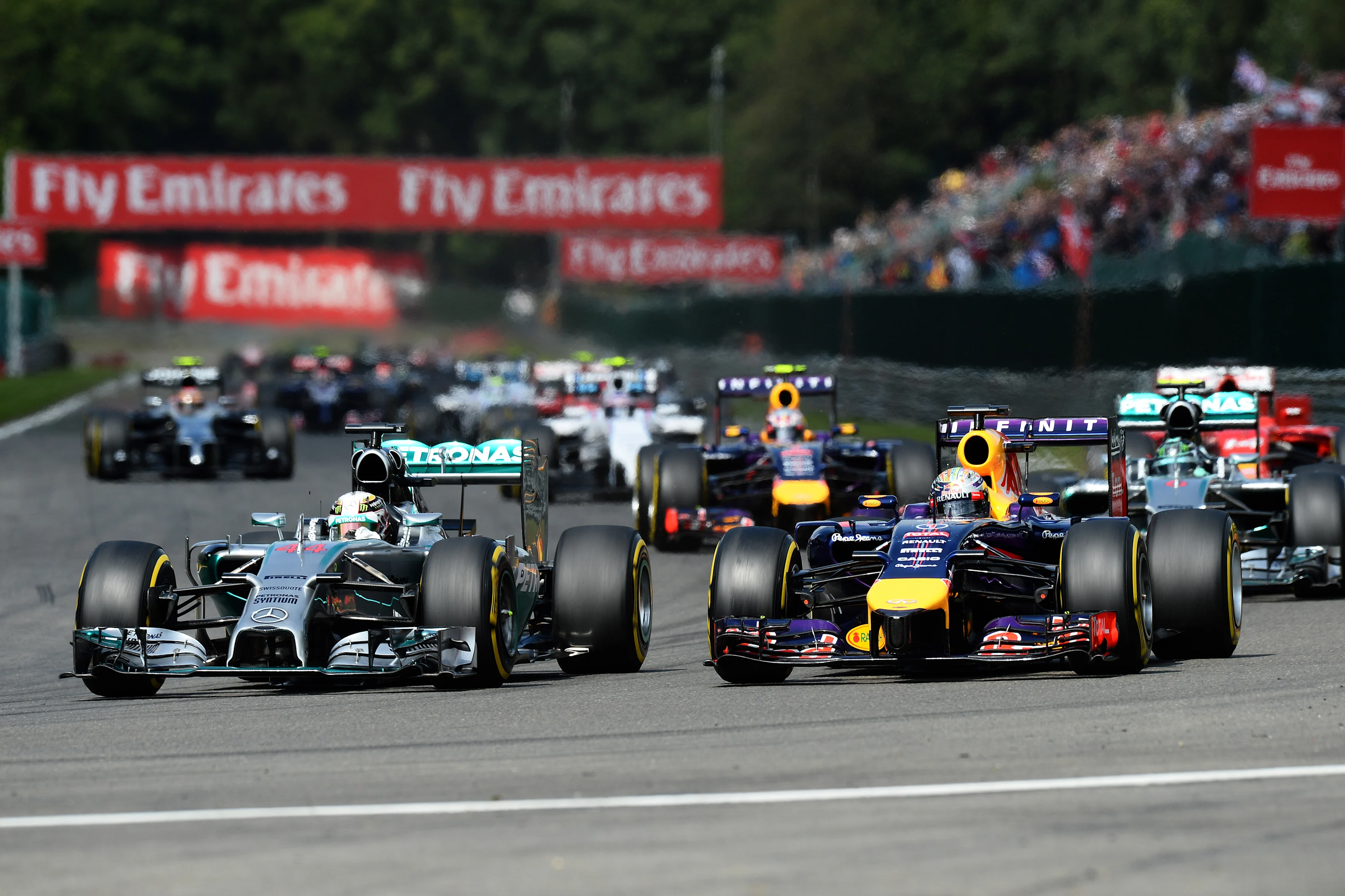 (L to R): Lewis Hamilton (GBR) Mercedes AMG F1 W05 alongside Sebastian Vettel (GER) Red Bull Racing RB10 at the start of the race.
Formula One World Championship, Rd12, Belgian Grand Prix, Race Day, Spa-Francorchamps, Belgium, Sunday 24 August 2014.