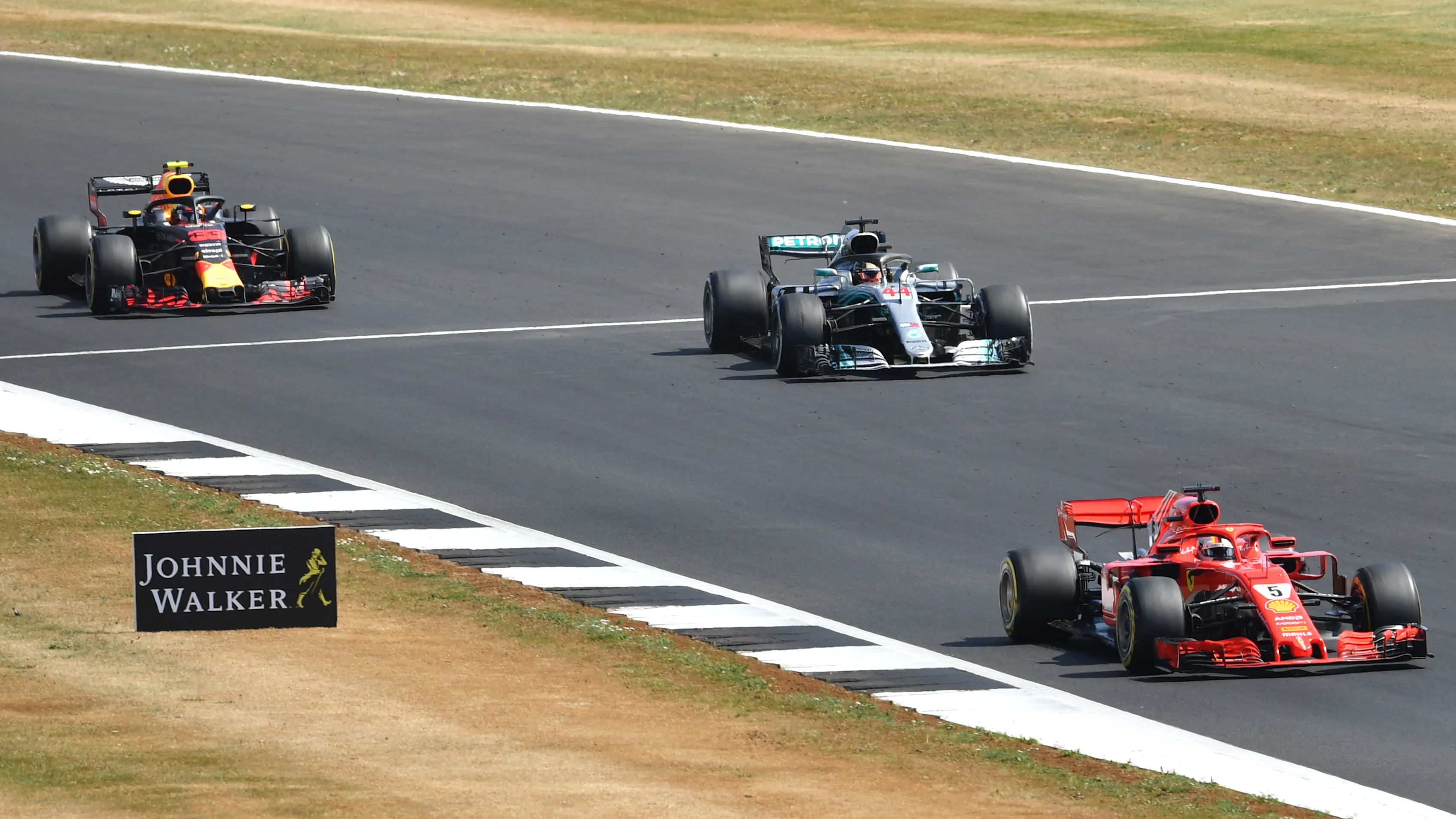 SILVERSTONE, UNITED KINGDOM - JULY 08: Sebastian Vettel (GER) Ferrari SF-71H, Lewis Hamilton (GBR)
