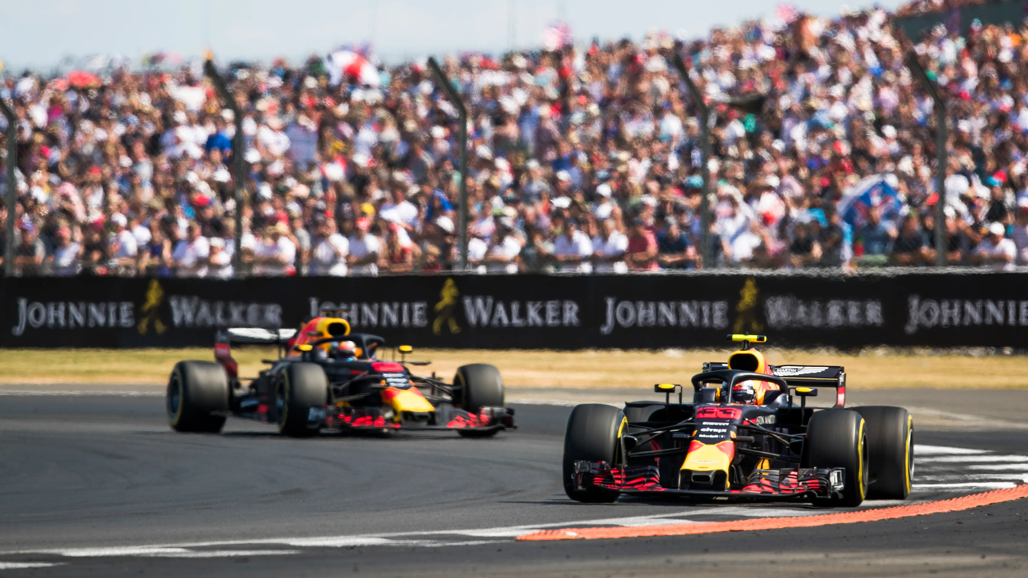 SILVERSTONE, UNITED KINGDOM - JULY 08: Max Verstappen, Red Bull Racing RB14 Tag Heuer, leads Daniel