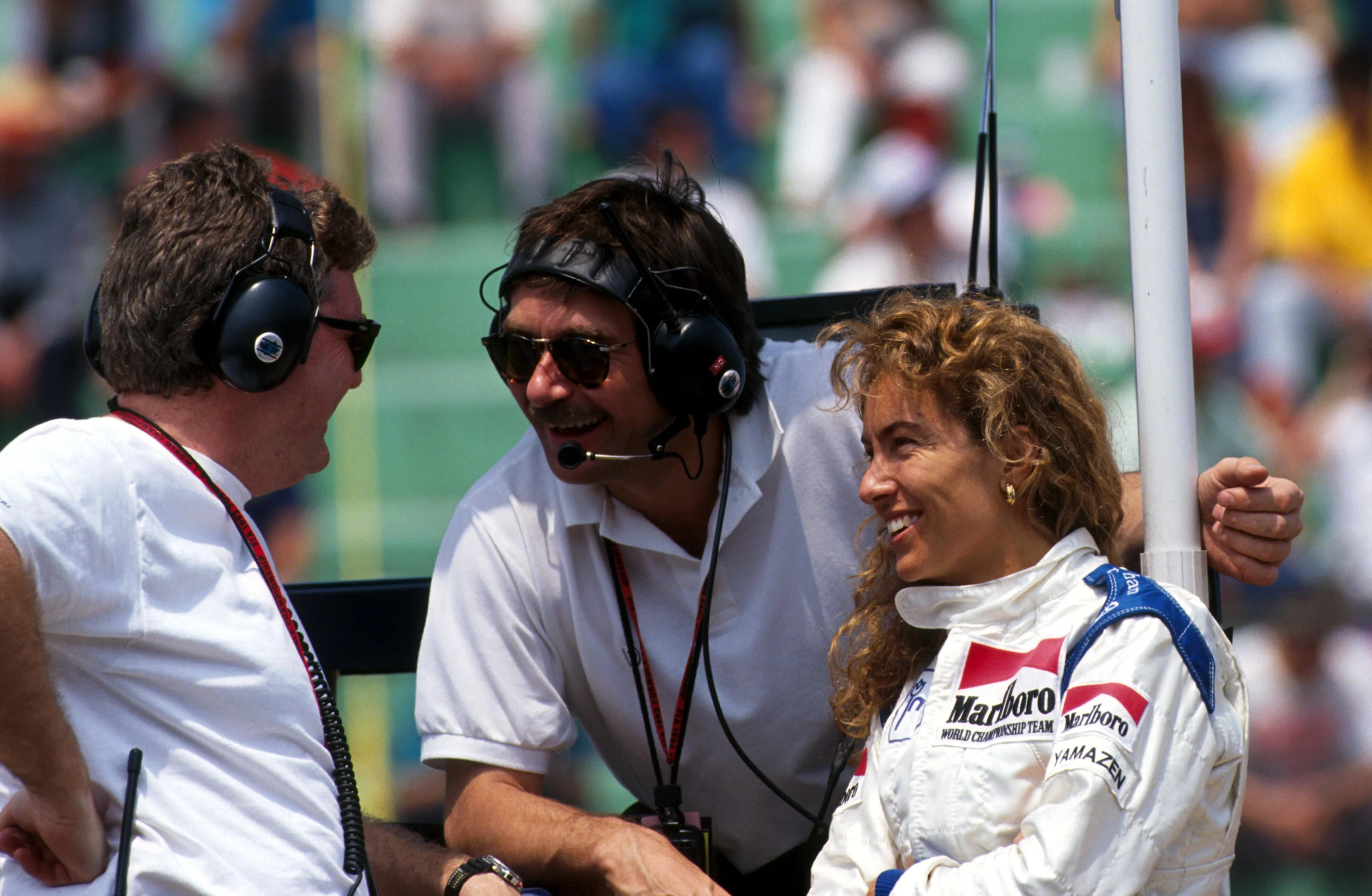 Giovanna Amati (ITA) right, with members of the Brabham team.\nMexican GP, Mexico City 22 March 1992. © Sutton Motorsport Images