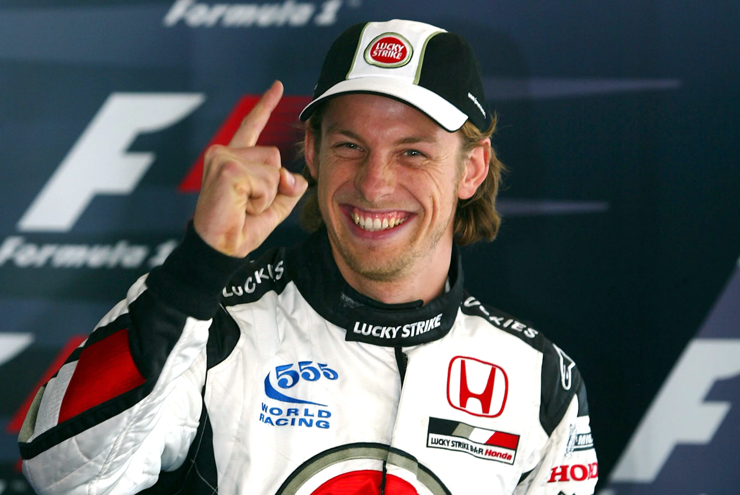 Jenson Button (GBR) BAR in the post qualifying press conference celebrates his first F1 pole