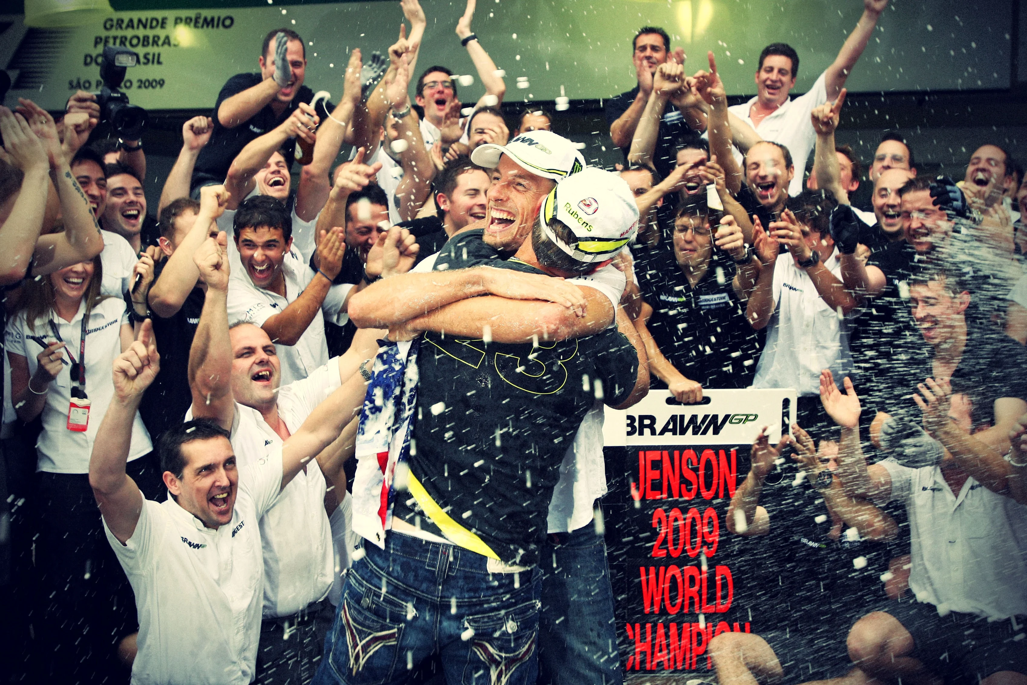 Rubens Barrichello (BRA) Brawn Grand Prix and World Champion Jenson Button (GBR) Brawn Grand Prix