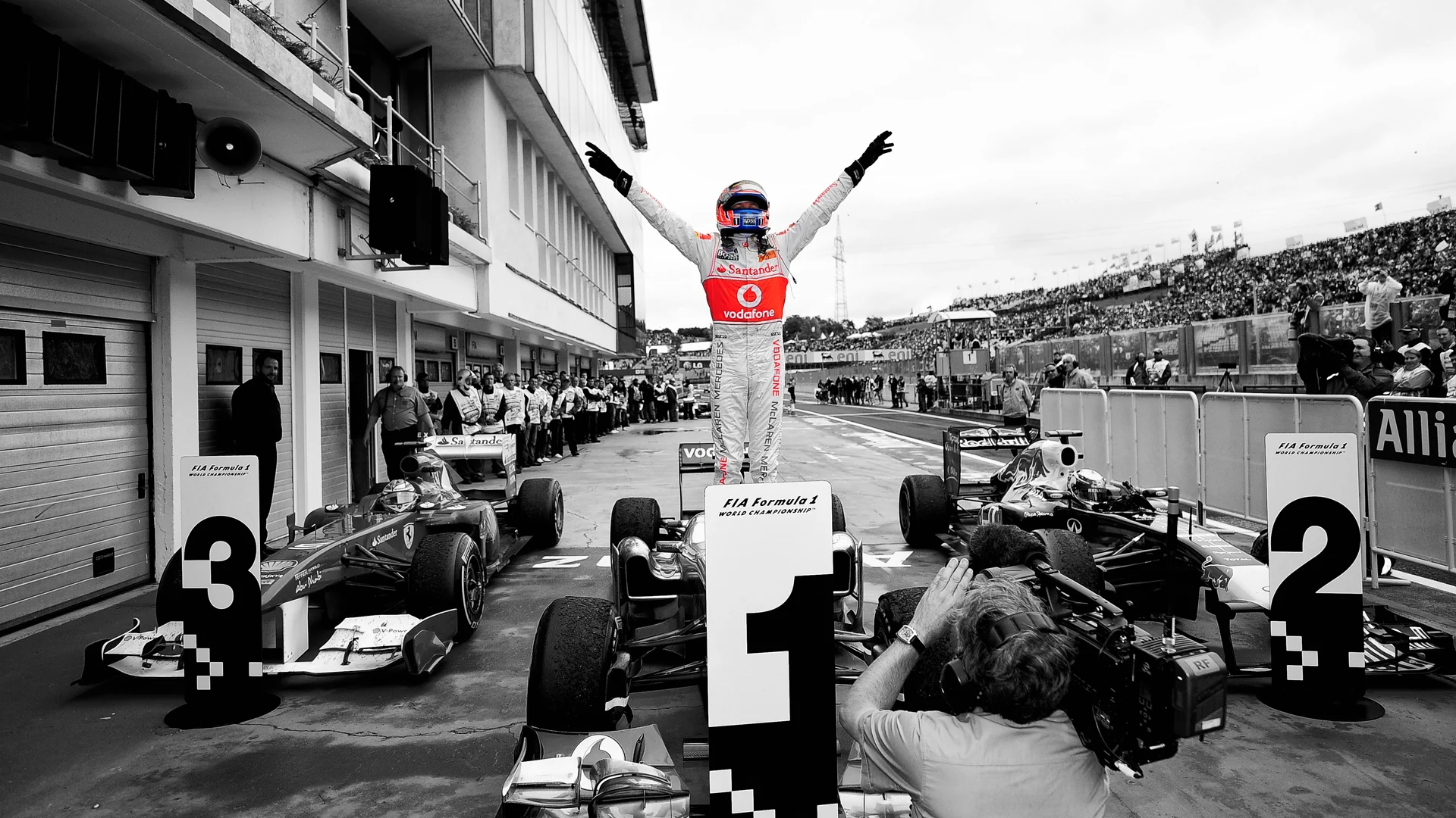 Race winner Jenson Button (GBR) McLaren MP4/26 celebrates in parc ferme. Formula One World