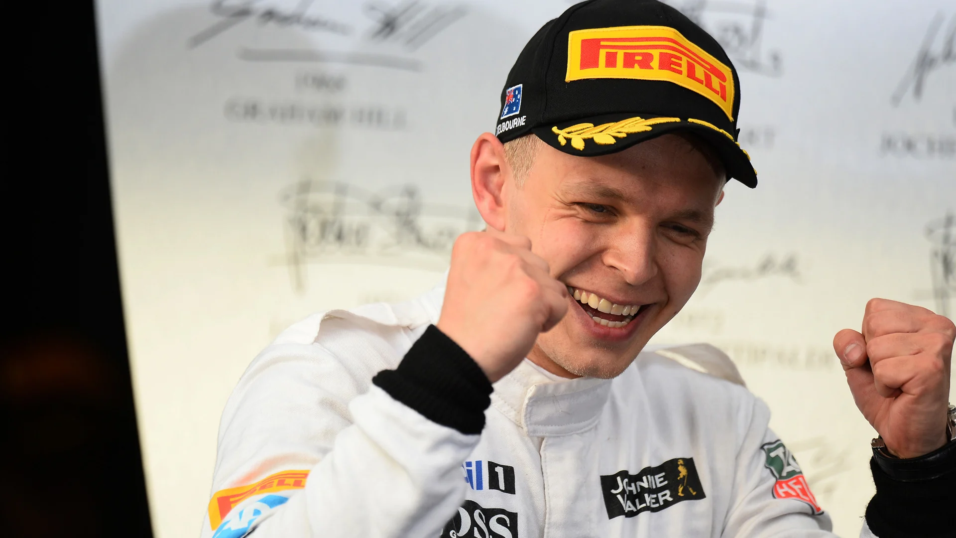 Kevin Magnussen (DEN) McLaren celebrates third place on the podium. Formula One World