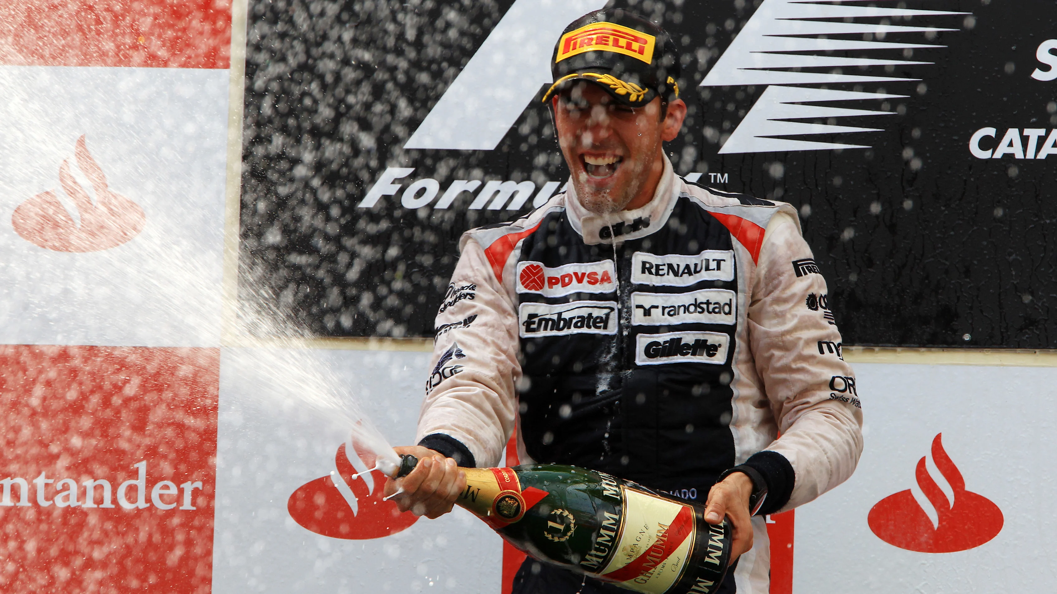Race winner Pastor Maldonado (VEN) Williams celebrates with the champagne. Formula One World