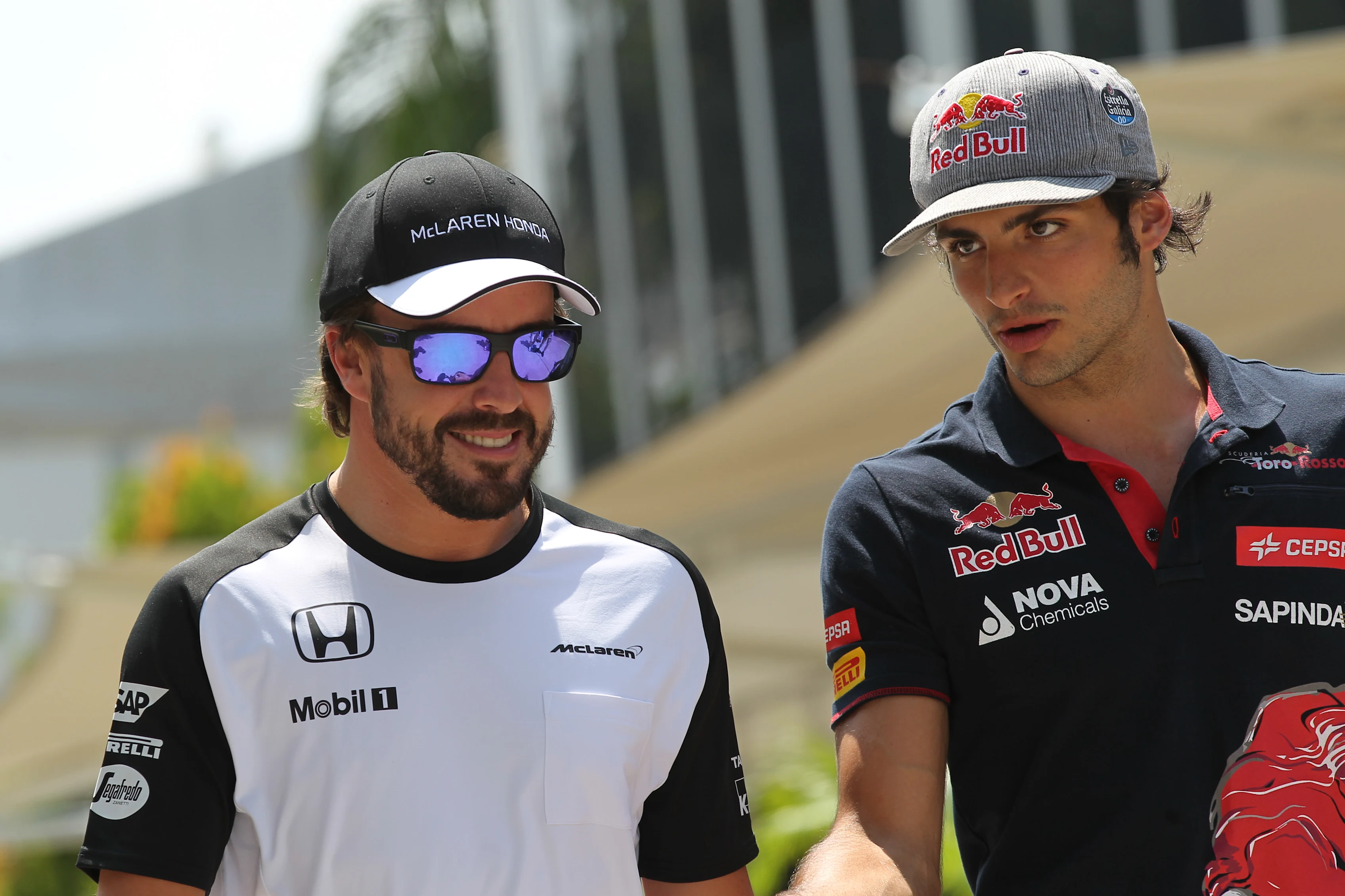 Fernando Alonso (ESP) McLaren and Carlos Sainz jr (ESP) Scuderia Toro Rosso at Formula One World Championship, Rd2, Malaysian Grand Prix, Preparations, Sepang, Malaysia, Thursday 26 March 2015. © Sutton Motorsport Images