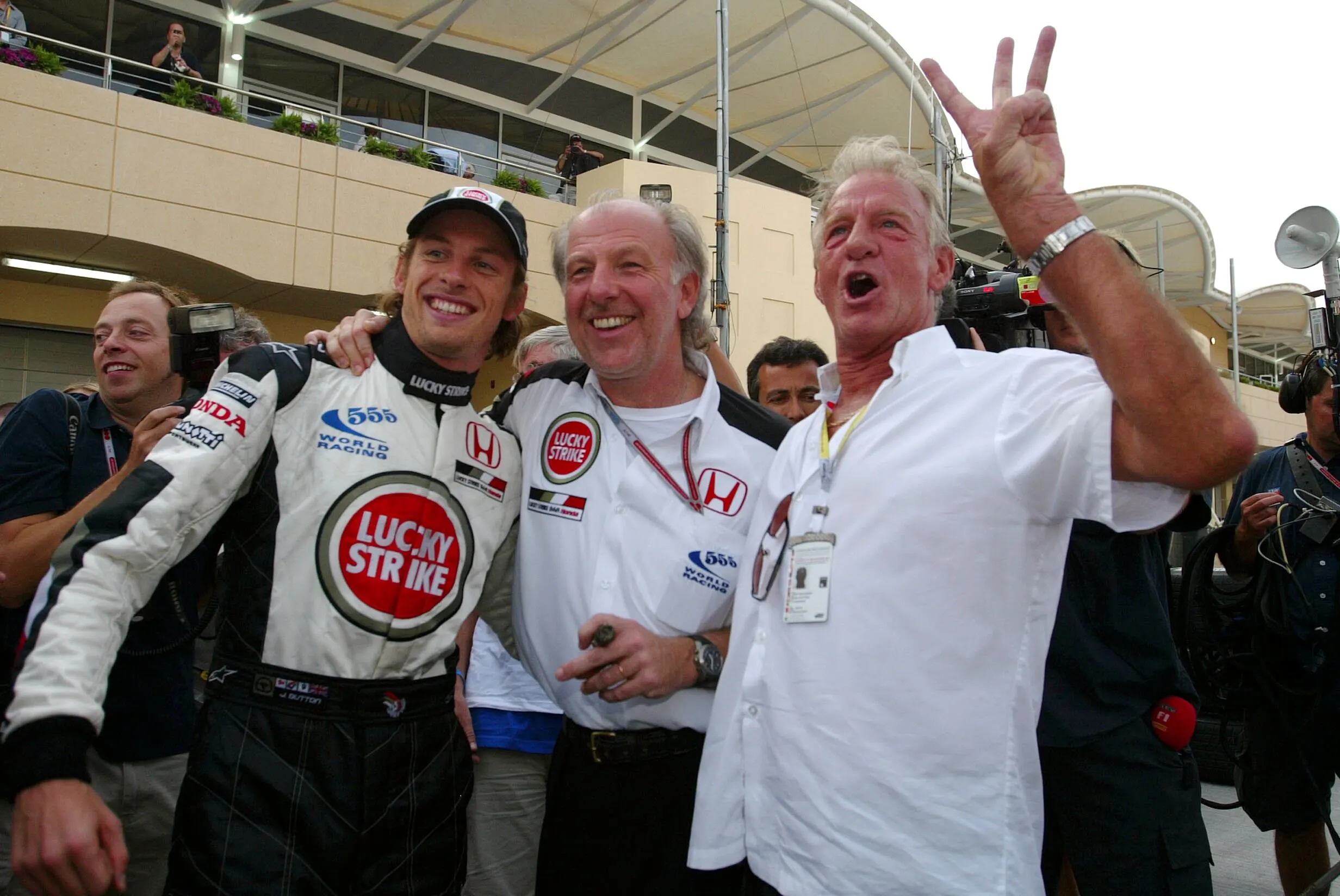 (L to R): Jenson Button (GBR) BAR, David Richards (GBR) BAR Team Principal John Button (GBR)