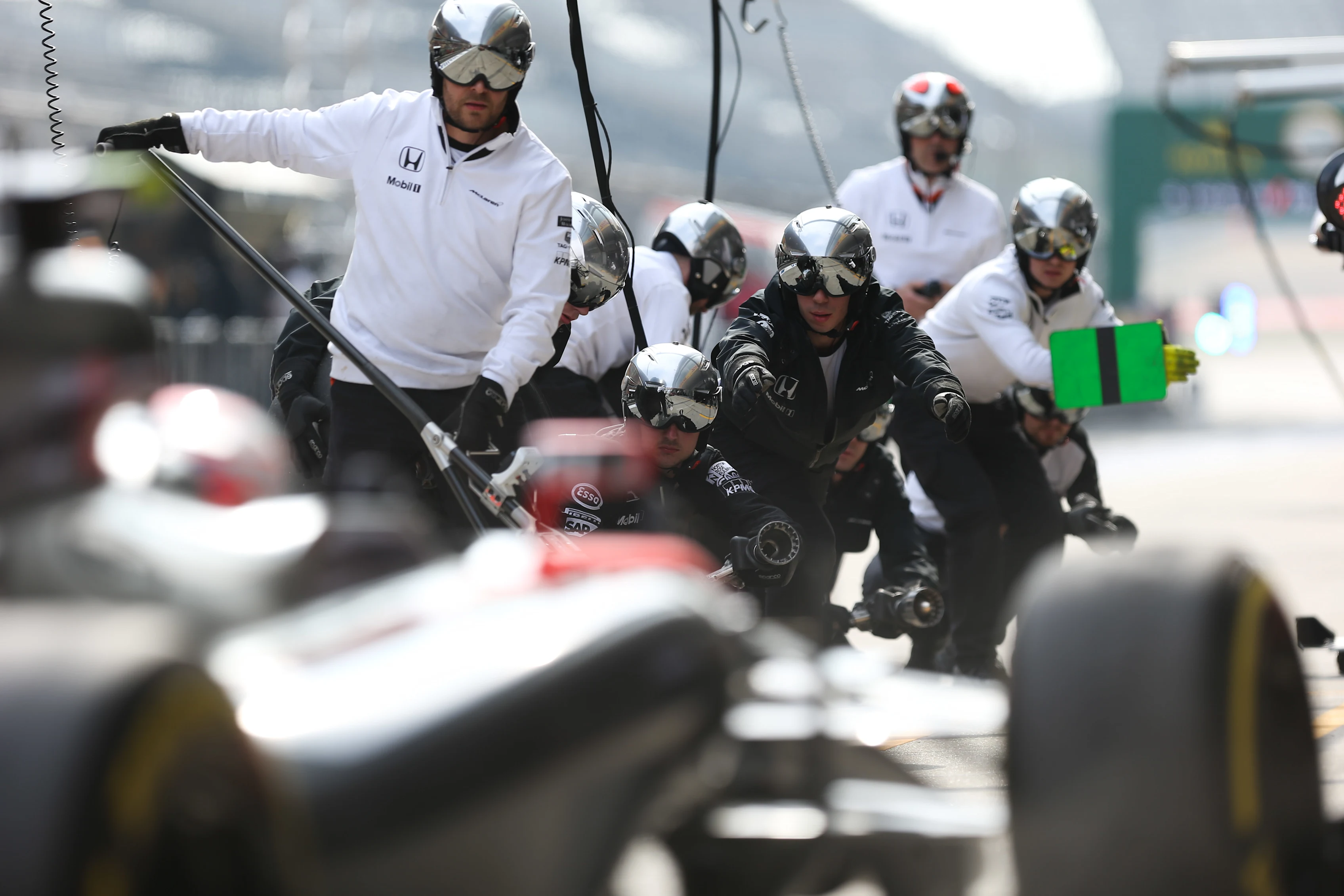 Fernando Alonso (ESP) McLaren MP4-30 makes a pitstop at Formula One World Championship, Rd3,