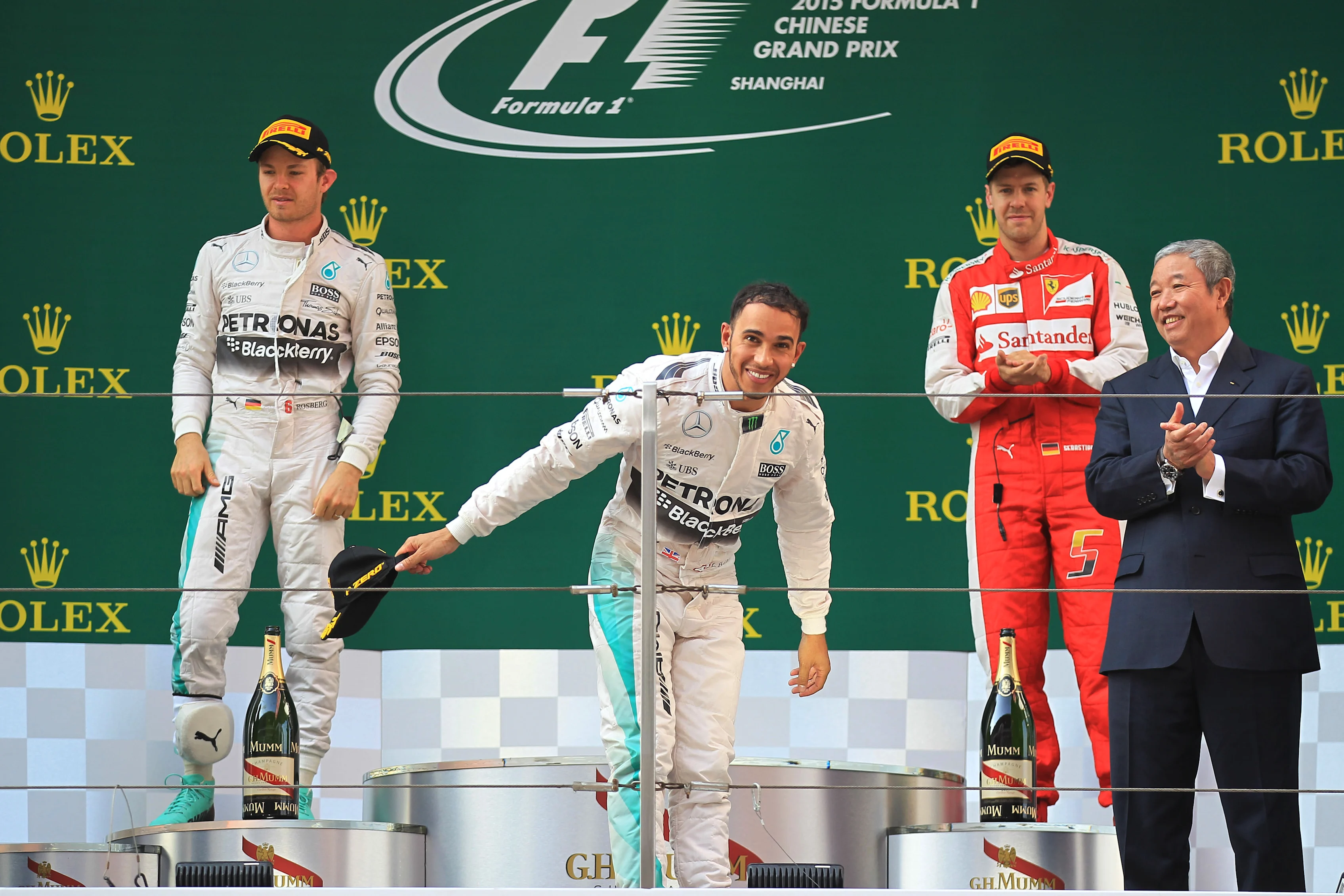 (L to R): Nico Rosberg (GER) Mercedes AMG F1, race winner Lewis Hamilton (GBR) Mercedes AMG F1 and Sebastian Vettel (GER) Ferrari celebrate on the podium at Formula One World Championship, Rd3, Chinese Grand Prix, Race, Shanghai, China, Sunday 12 April 2015. © Sutton Motorsport Images
