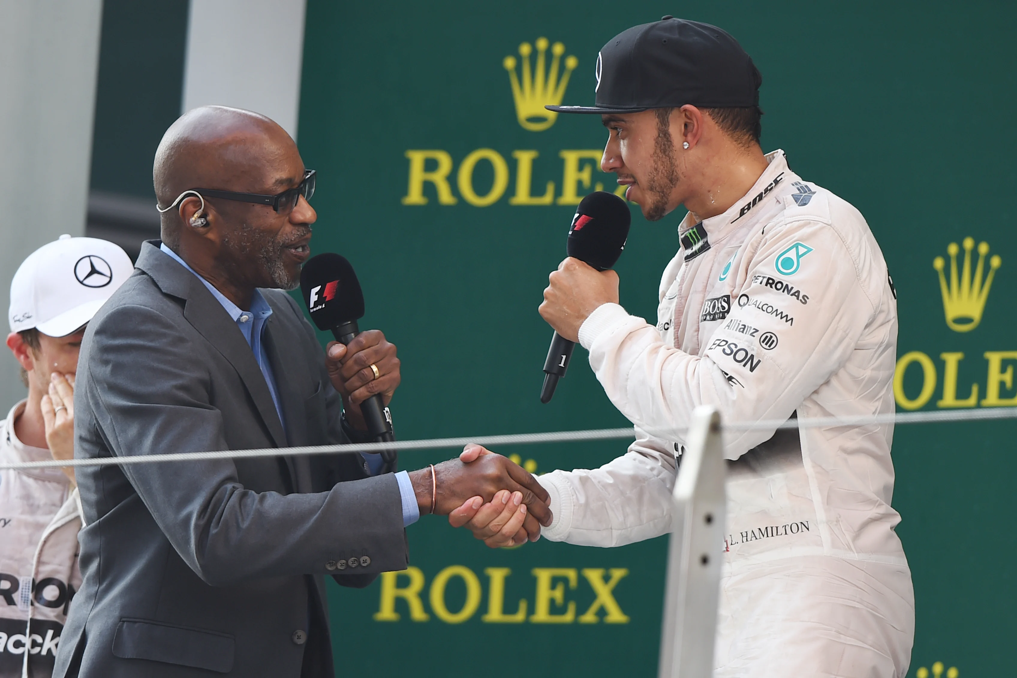 Edwin Moses (USA), legendary 400 metre hurdler, talks to Lewis Hamilton (GBR) Mercedes AMG F1 on the podium at Formula One World Championship, Rd3, Chinese Grand Prix, Race, Shanghai, China, Sunday 12 April 2015. © Sutton Motorsport Images