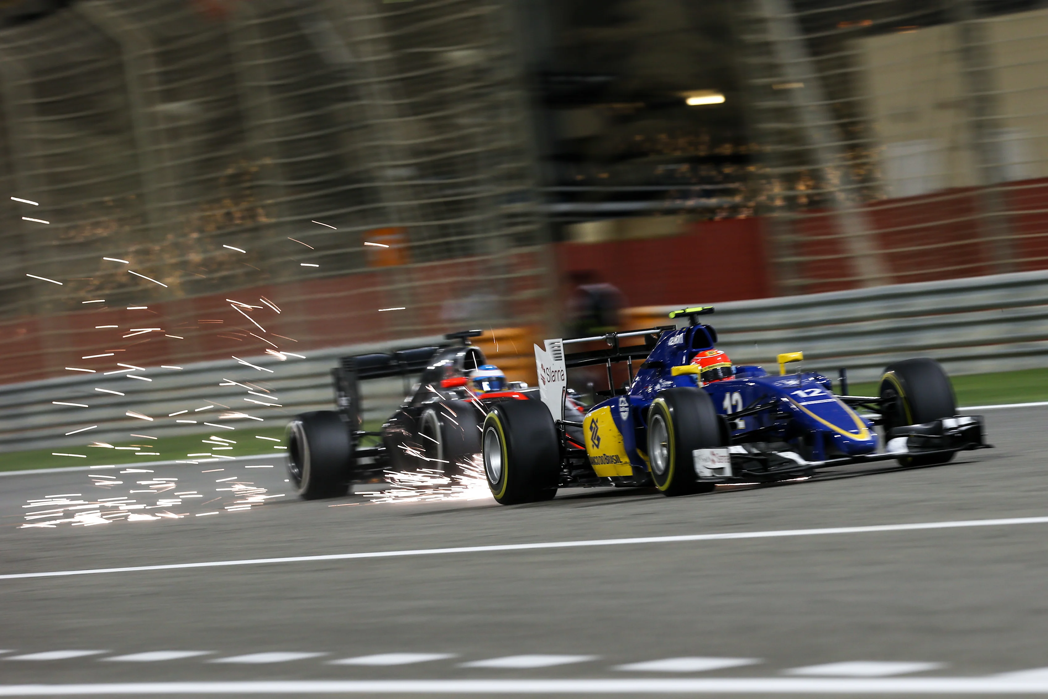 Felipe Nasr (BRA) Sauber C34 sparks at Formula One World Championship, Rd4, Bahrain Grand Prix Race, Bahrain International Circuit, Sakhir, Bahrain, Sunday 19  April 2015. © Sutton Motorsport Images