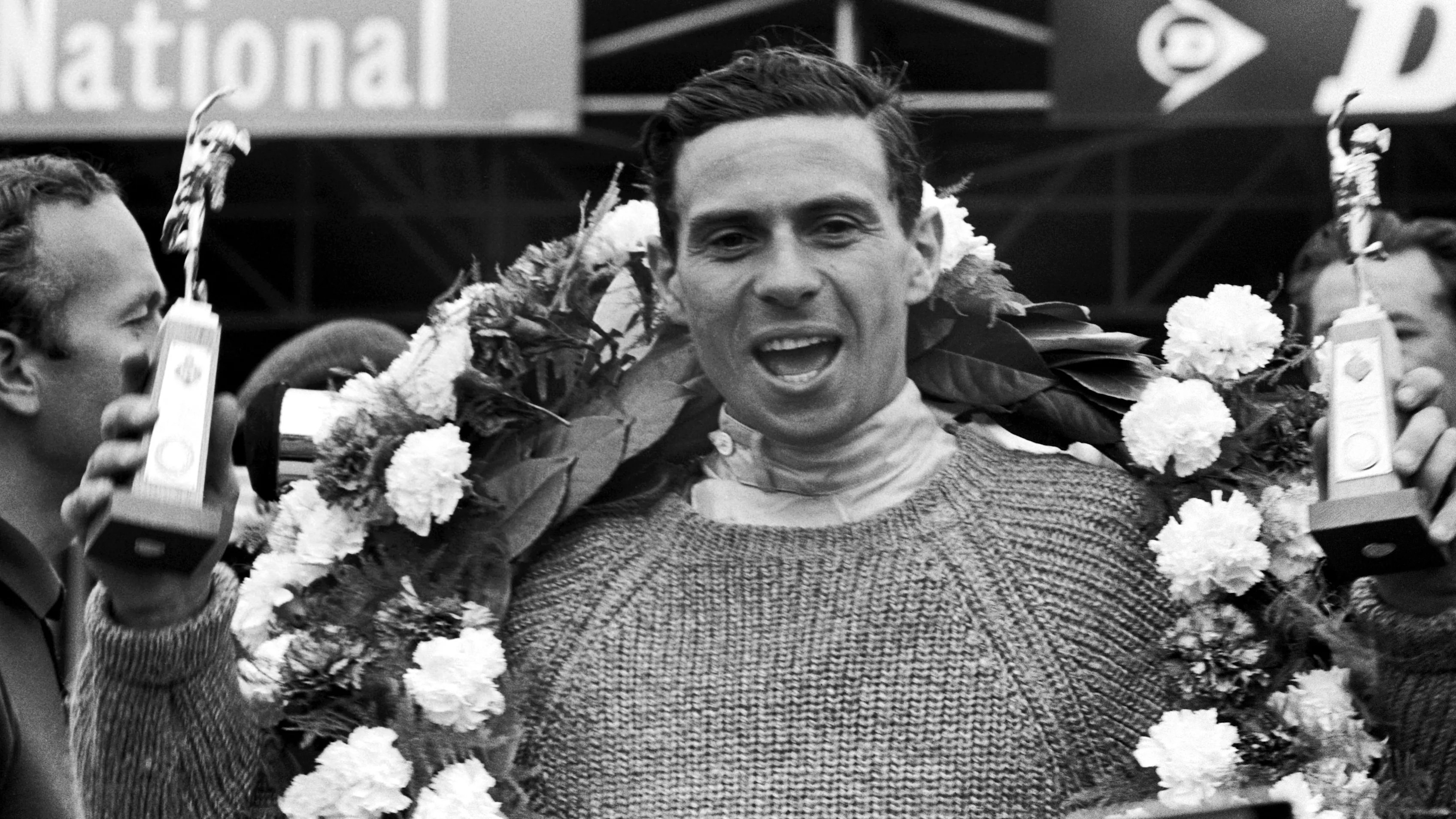 Race winner Jim Clark (GBR) Lotus celebrates his victory. British Grand Prix, Silverstone, 10 July