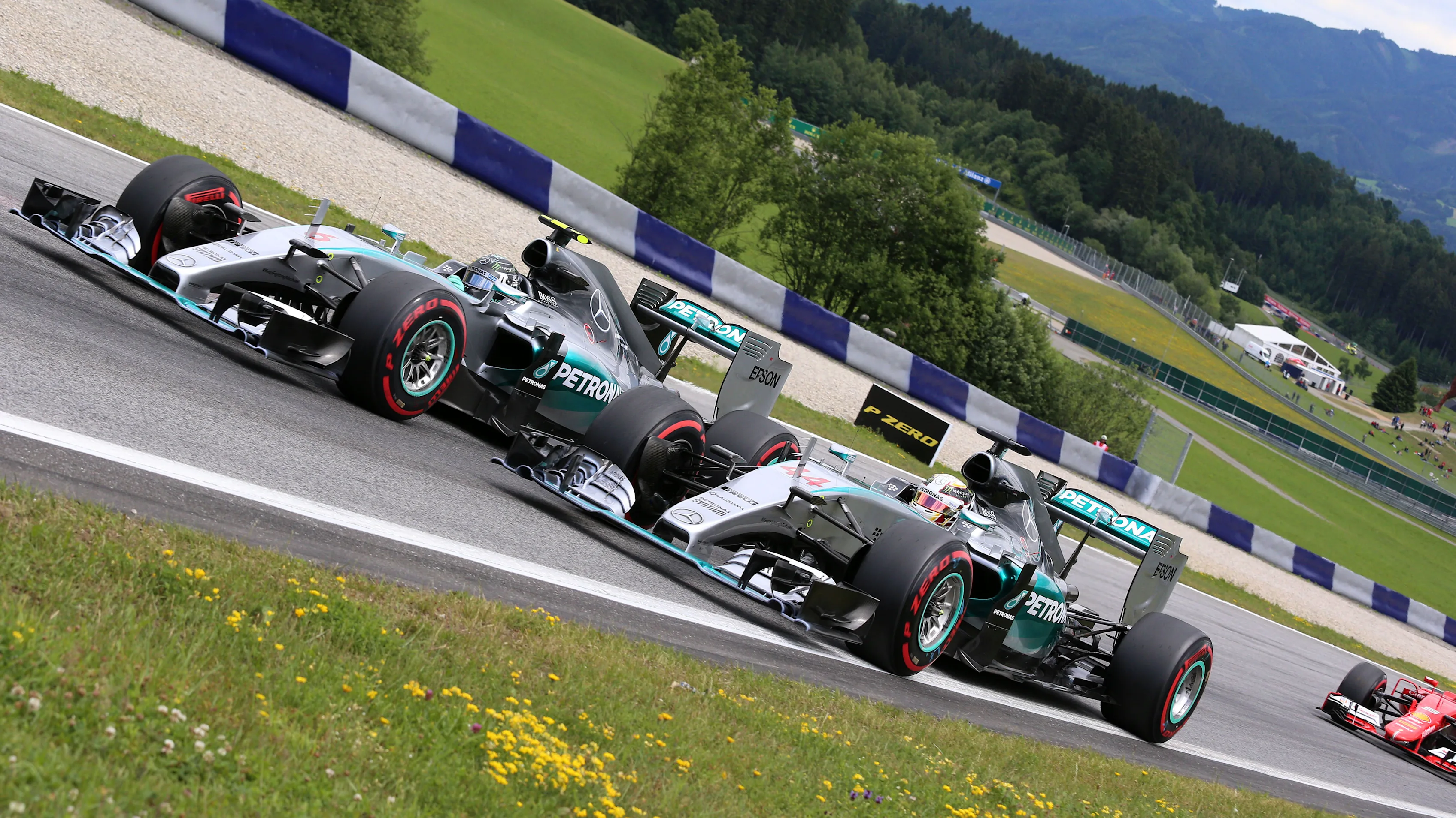 Nico Rosberg (GER) Mercedes AMG F1 W06 and Lewis Hamilton (GBR) Mercedes AMG F1 W06 at the start of the race at Formula One World Championship, Rd8, Austrian Grand Prix, Race, Spielberg, Austria, Sunday 21 June 2015. © Sutton Motorsport Images