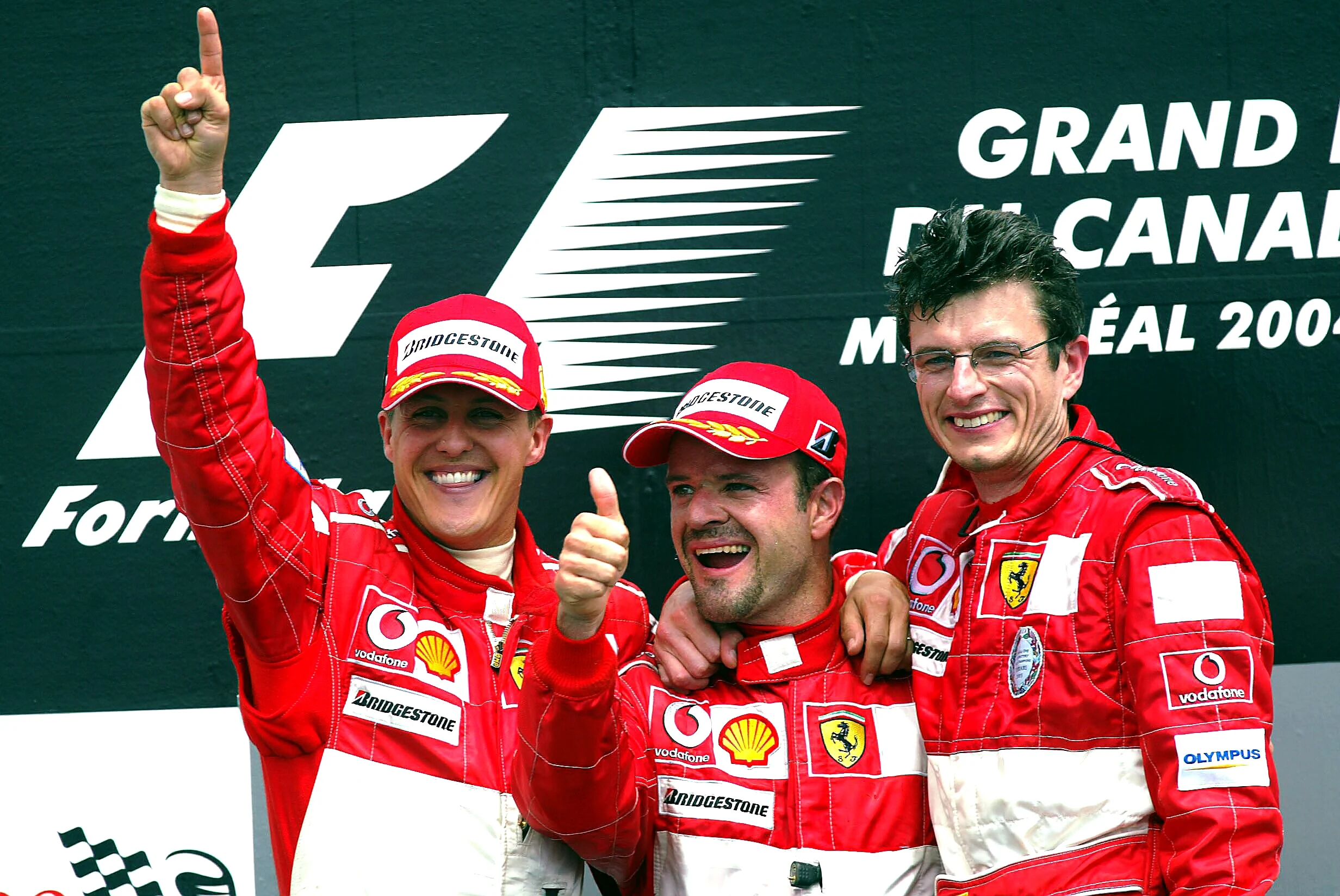 (L to R): race winner Michael Schumacher (GER) Ferrari; third placed Rubens Barrichello (BRA)