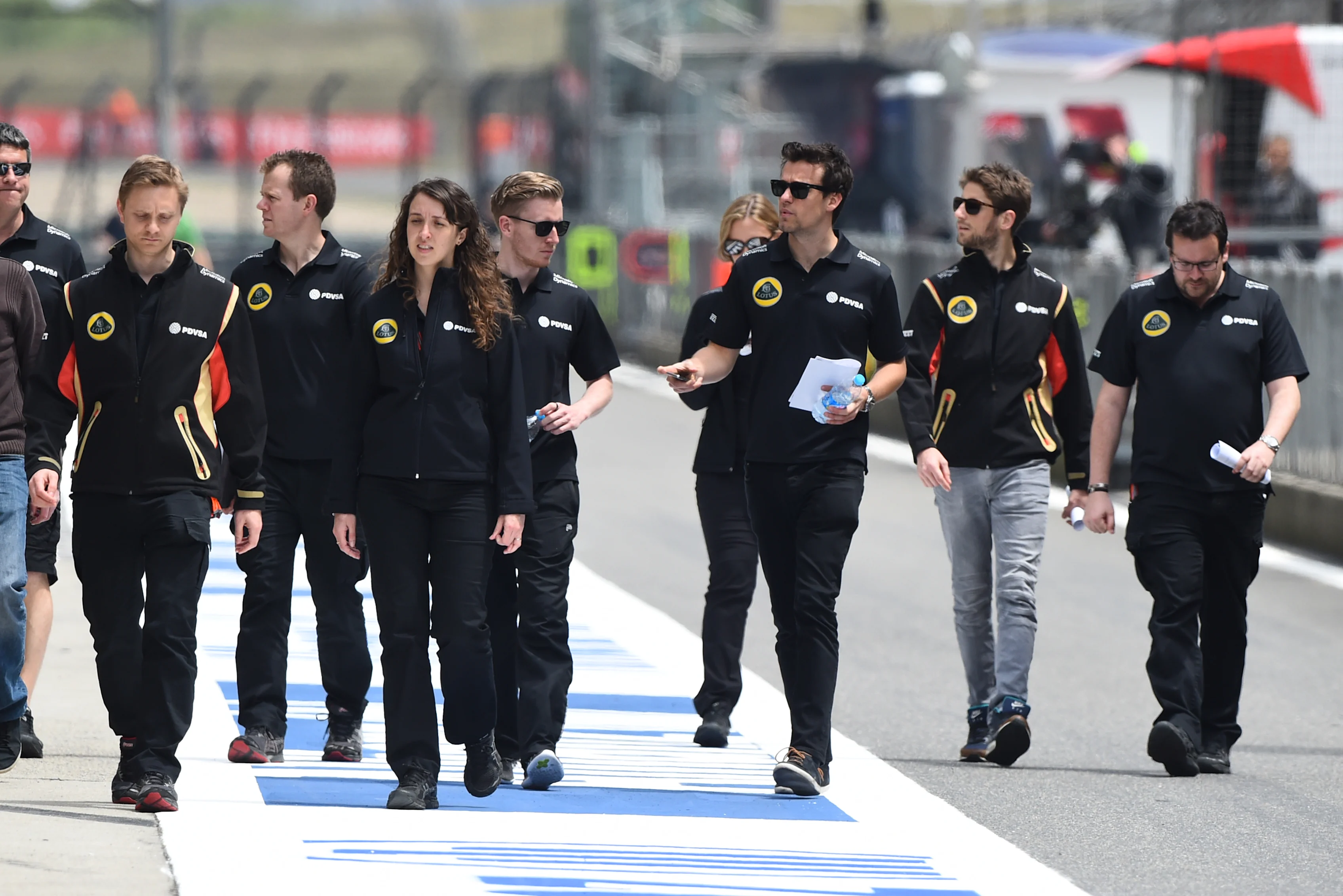 Jolyon Palmer (GBR) Lotus Test and Reserve Driver and Romain Grosjean (FRA) Lotus at Formula One World Championship, Rd3, Chinese Grand Prix, Preparations, Shanghai, China, Thursday 9 April 2015. © Sutton Motorsport Images