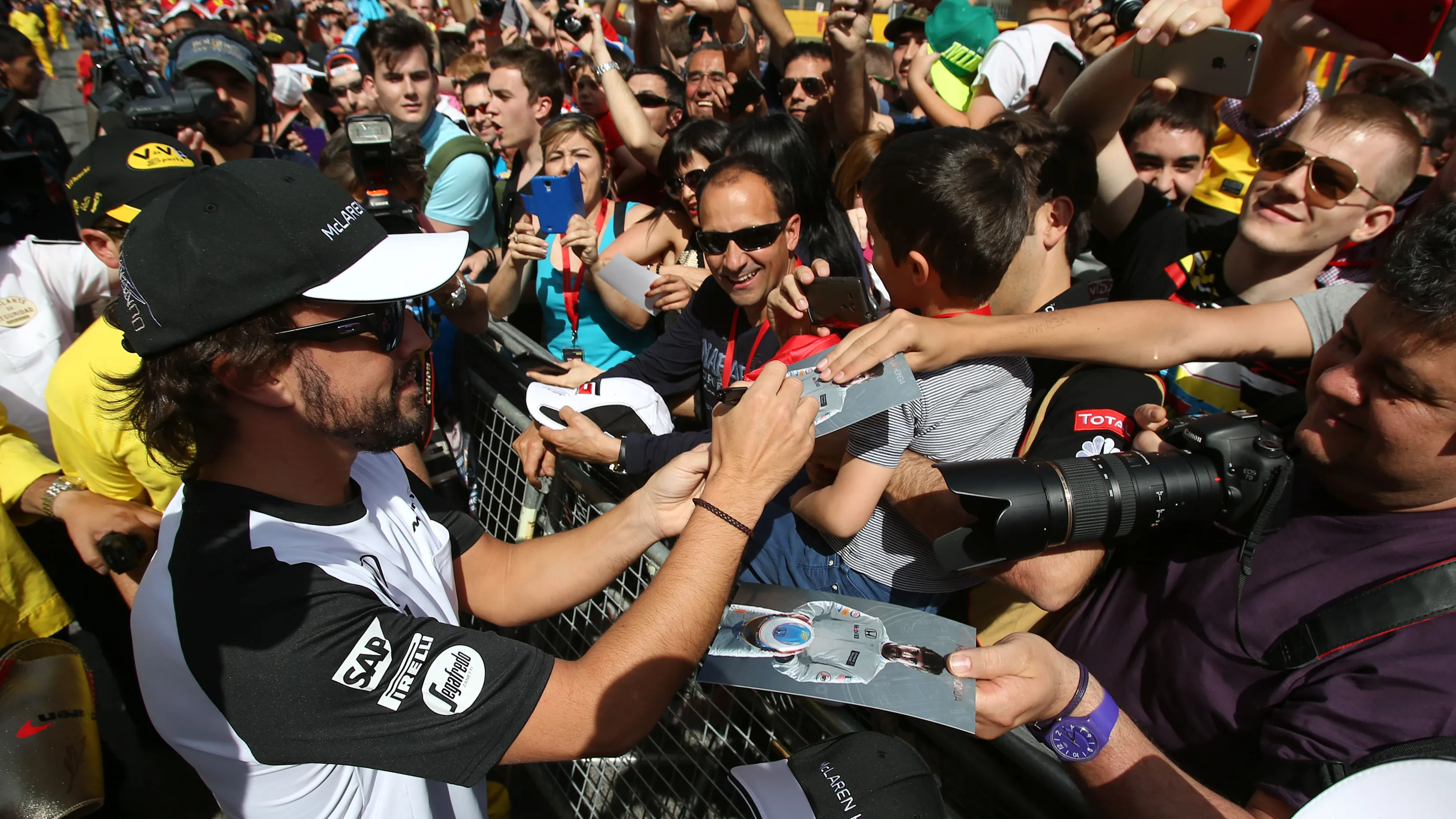 Fernando Alonso (ESP) McLaren signs autographs for the fans at Formula One World Championship, Rd5,