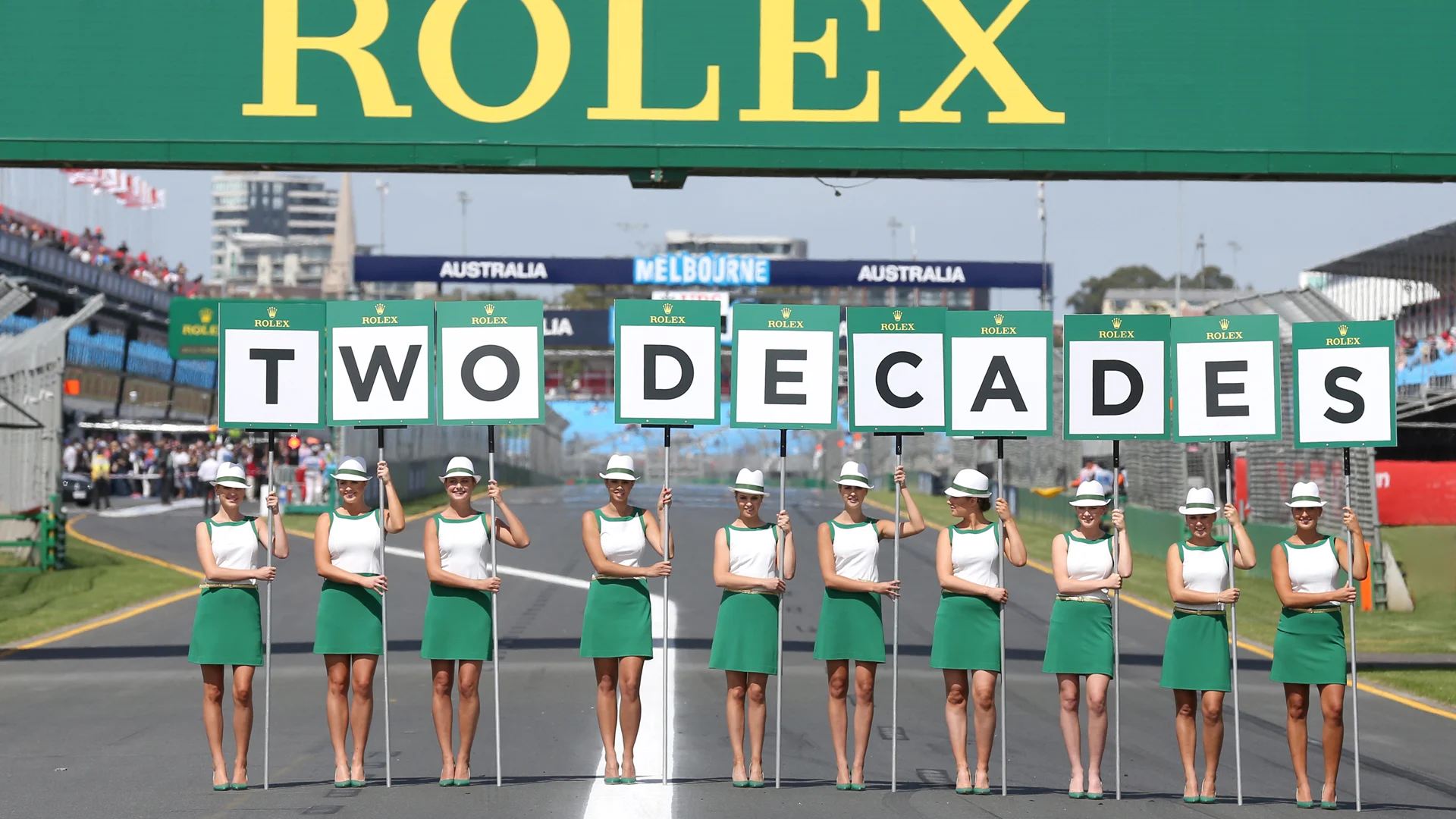 Grid Girls with "Two Decades" Australian Grand Prix boards, © Rolex