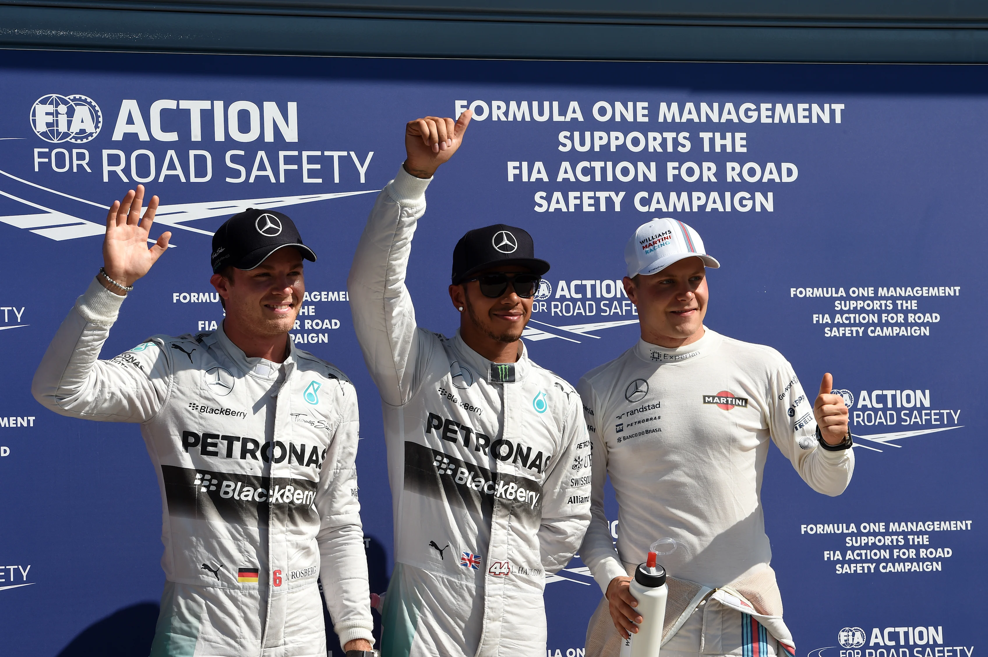 (L to R): Nico Rosberg (GER) Mercedes AMG F1, pole sitter Lewis Hamilton (GBR) Mercedes AMG F1 and Valtteri Bottas (FIN) Williams celebrate in parc ferme.
Formula One World Championship, Rd13, Italian Grand Prix, Monza, Italy, Qualifying, Saturday 6 September 2014.
