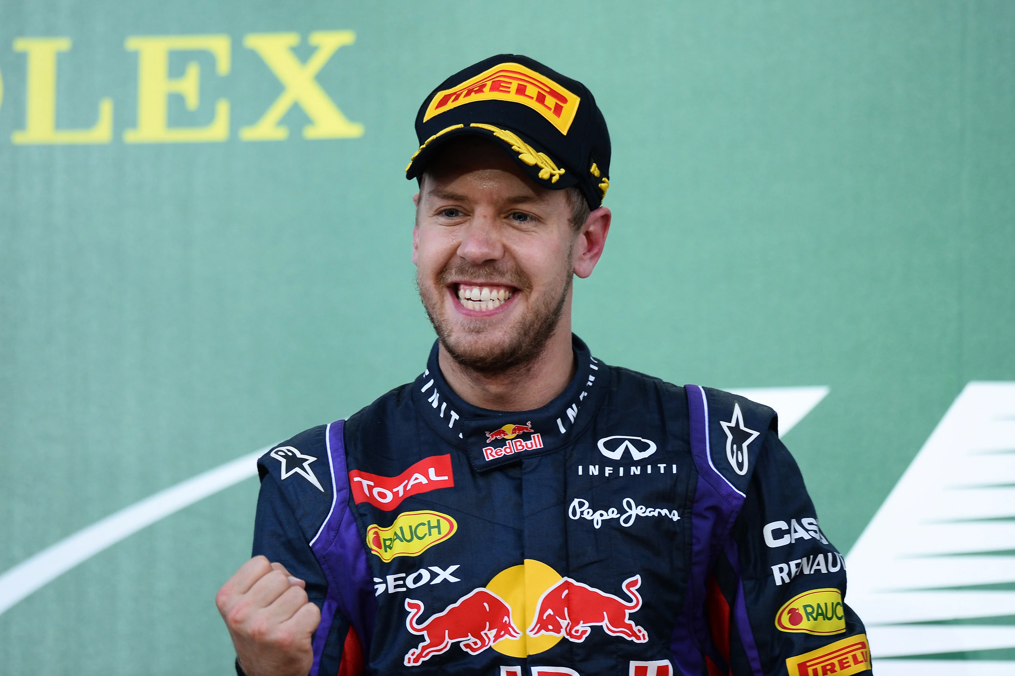 Race winner Sebastian Vettel (GER) Red Bull Racing celebrates on the podium. Formula One World