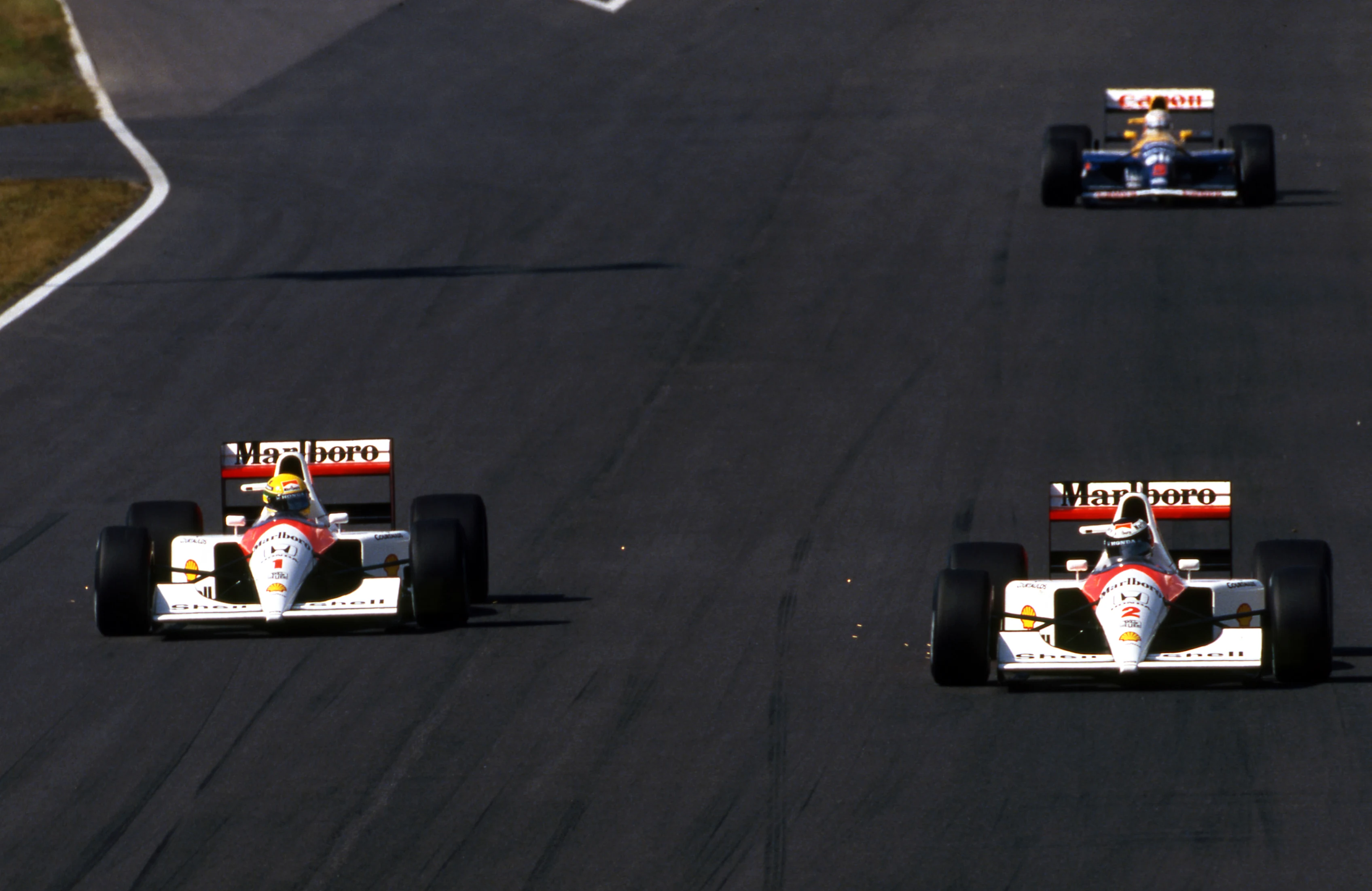 Gergard Berger (AUT) McLaren MP4/6, Ayrton Senna (BRA) McLaren MP4/6 and Nigel Mansell (GBR)