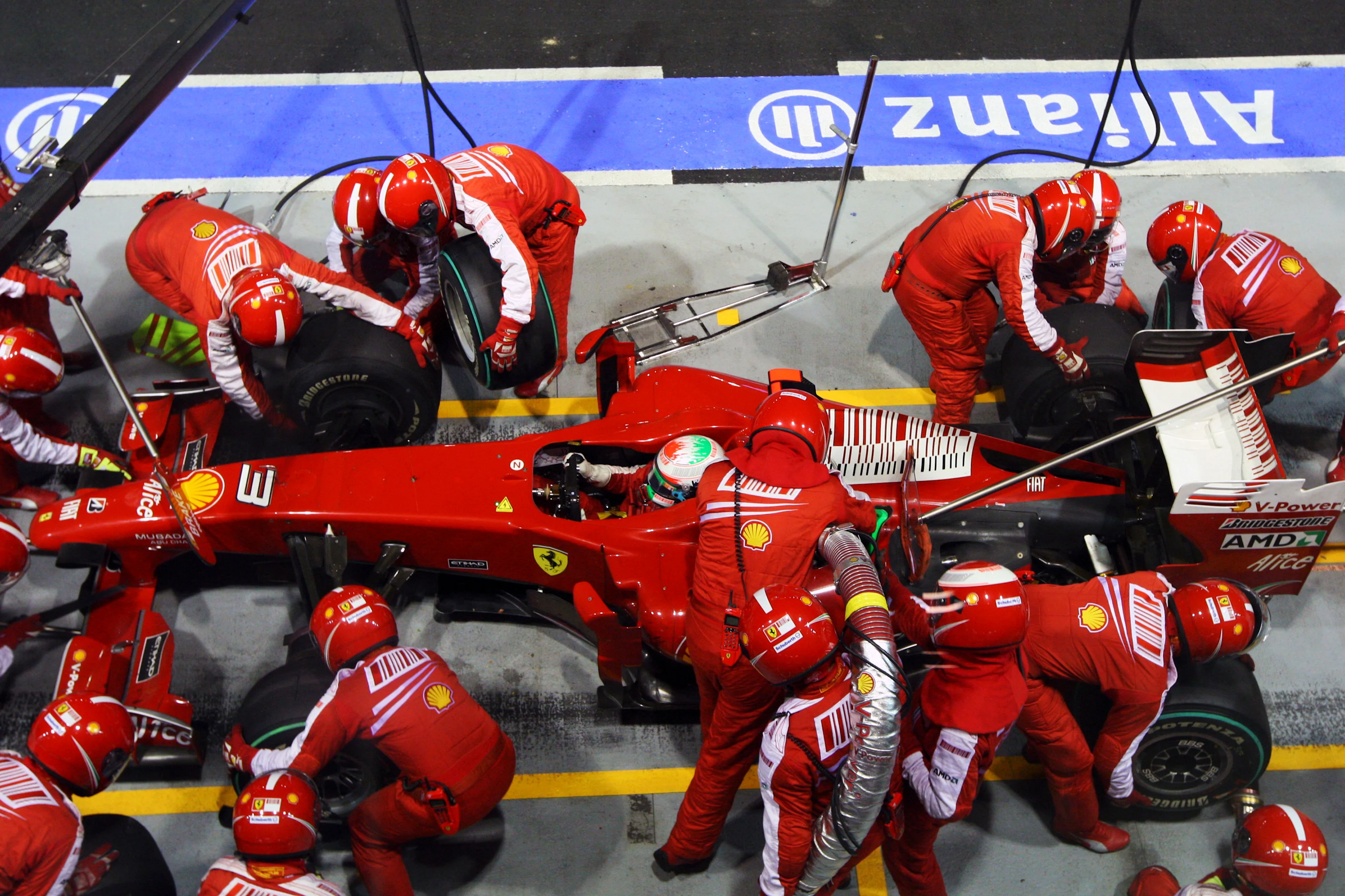 Giancarlo Fisichella (ITA) Ferrari F60 makes a pit stop.  Formula One World Championship, Rd 14,