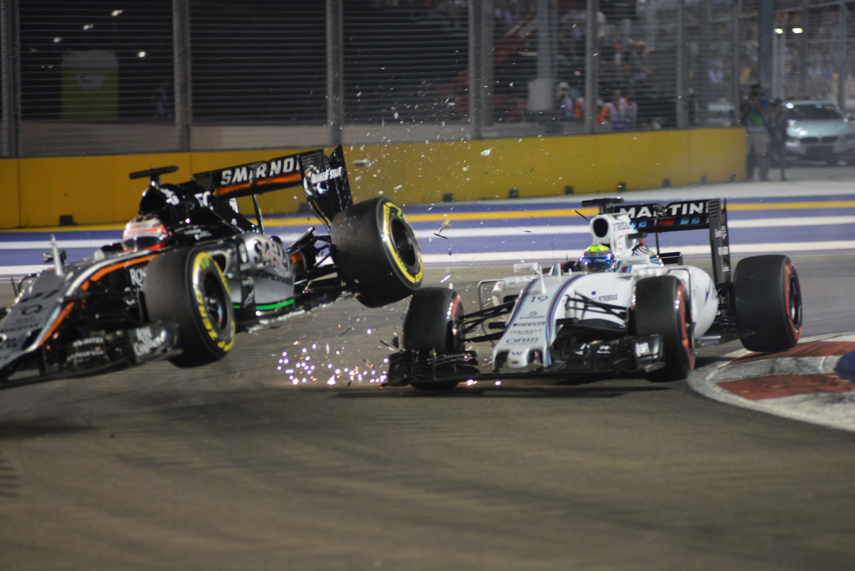 Nico Hulkenberg (GER) Force India VJM08 and Felipe Massa (BRA) Williams FW37 collide at Formula One