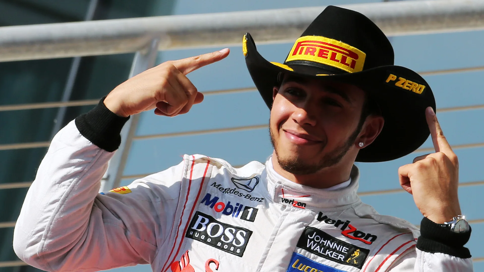 Race winner Lewis Hamilton (GBR) McLaren celebrates on the podium. Formula One World Championship,