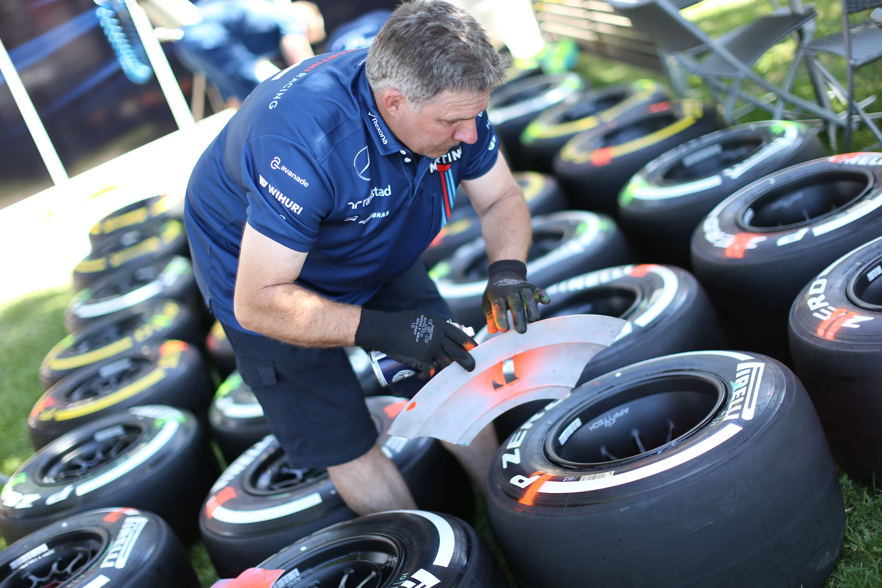 Williams mechanic preparing Pirelli tyres at Formula One World Championship, Rd1, Australian Grand