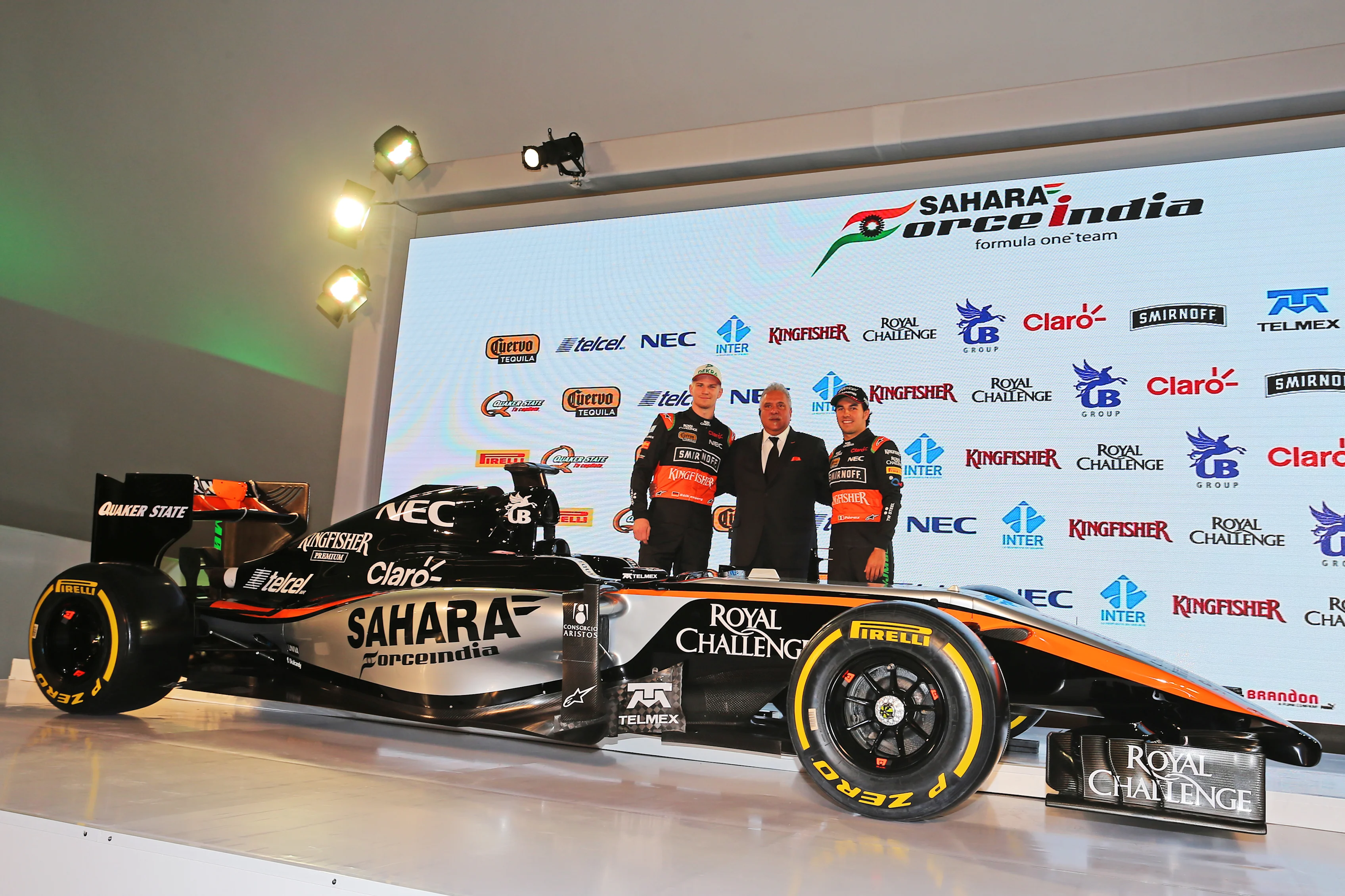 (L to R): Nico Hulkenberg (GER) Force India F1, Dr. Vijay Mallya (IND) Force India Formula One Team Owner and Sergio Perez (MEX) Force India at the Sahara Force India 2015 Team Launch, Museo Soumaya, Mexico City, Mexico, 21 January 2015. ©Force India