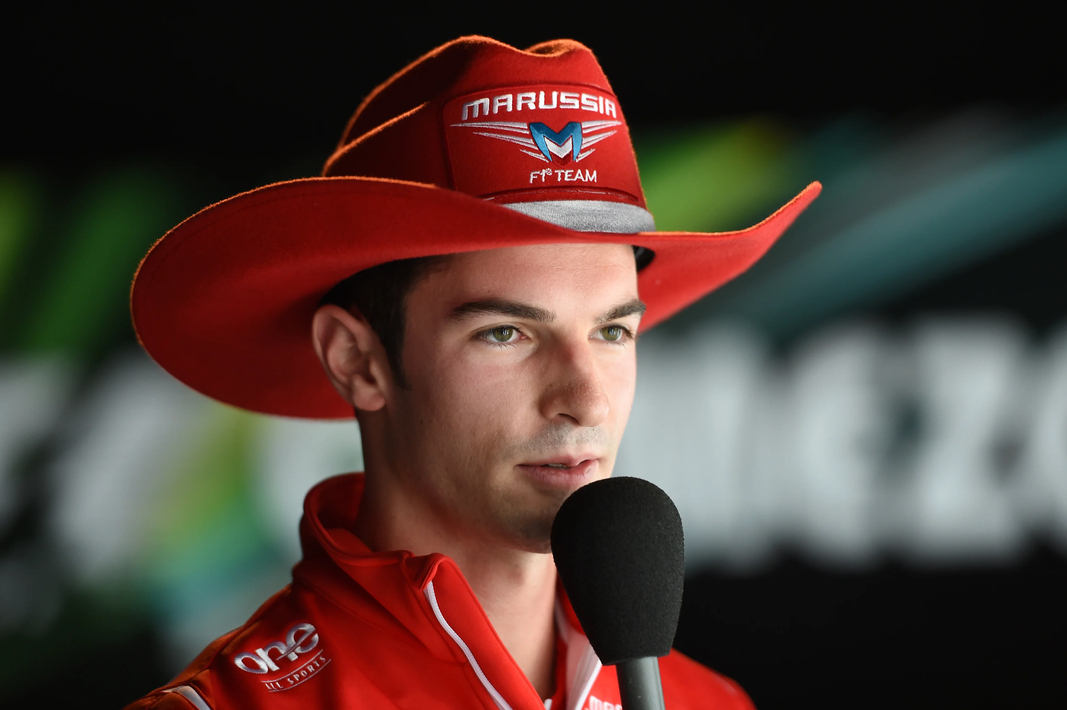 Alexander Rossi (USA) Marussia and USGP Cowboy hat. Formula One World Championship, Rd13, Italian