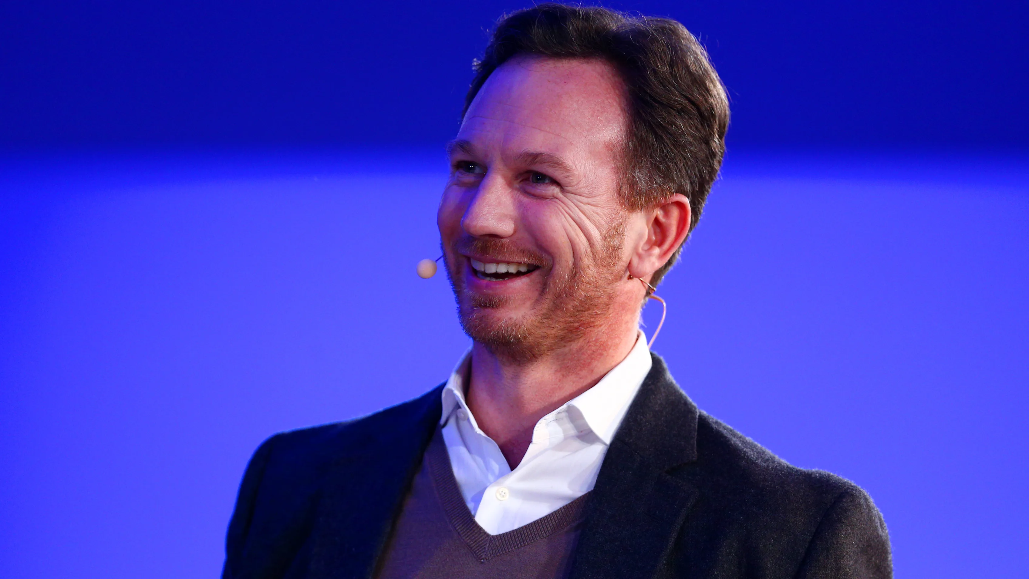 LONDON, ENGLAND - FEBRUARY 17:  Red Bull Racing Team Principal Christian Horner speaks with Adam