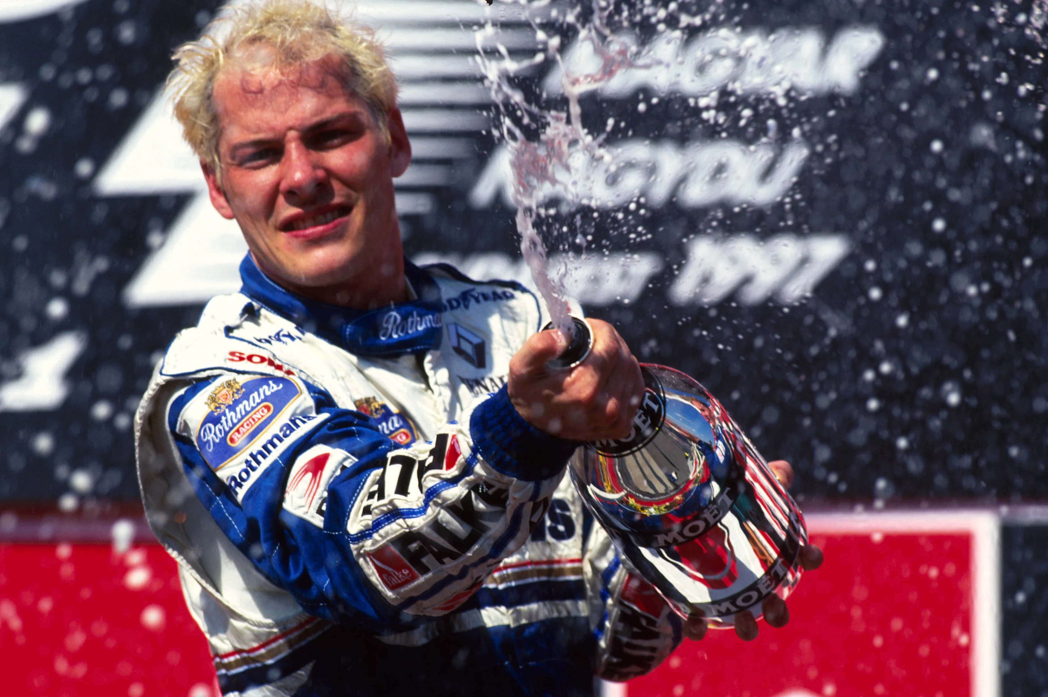 Jacques Villeneuve (CDN) Williams celebrates victory. Formula One World Championship, Hungarian Grand Prix, Rd 11, Budapest, Hungary, 10 August 1997