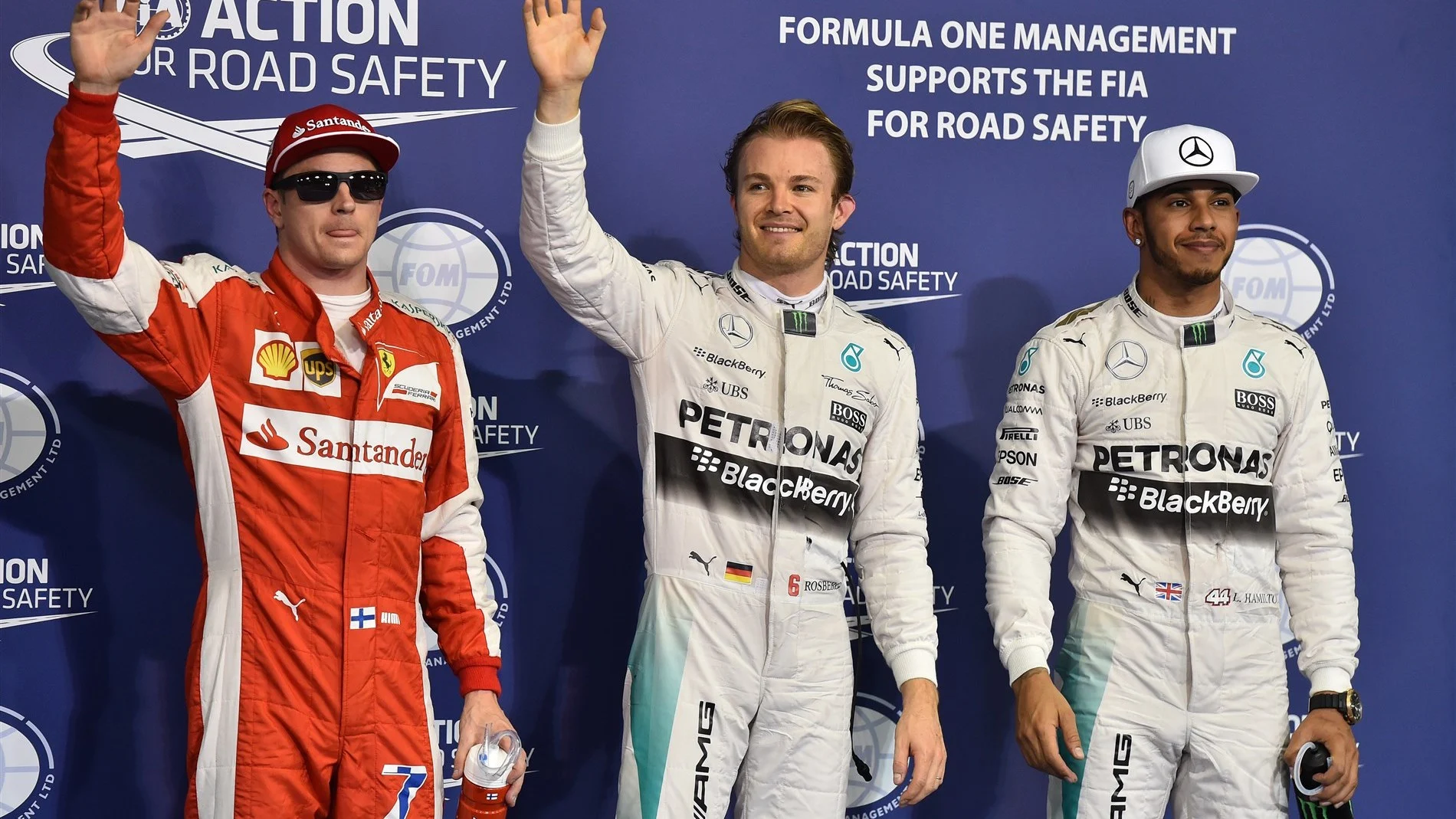 (L to R): Kimi Raikkonen (FIN) Ferrari, pole sitter Nico Rosberg (GER) Mercedes AMG F1 and Lewis