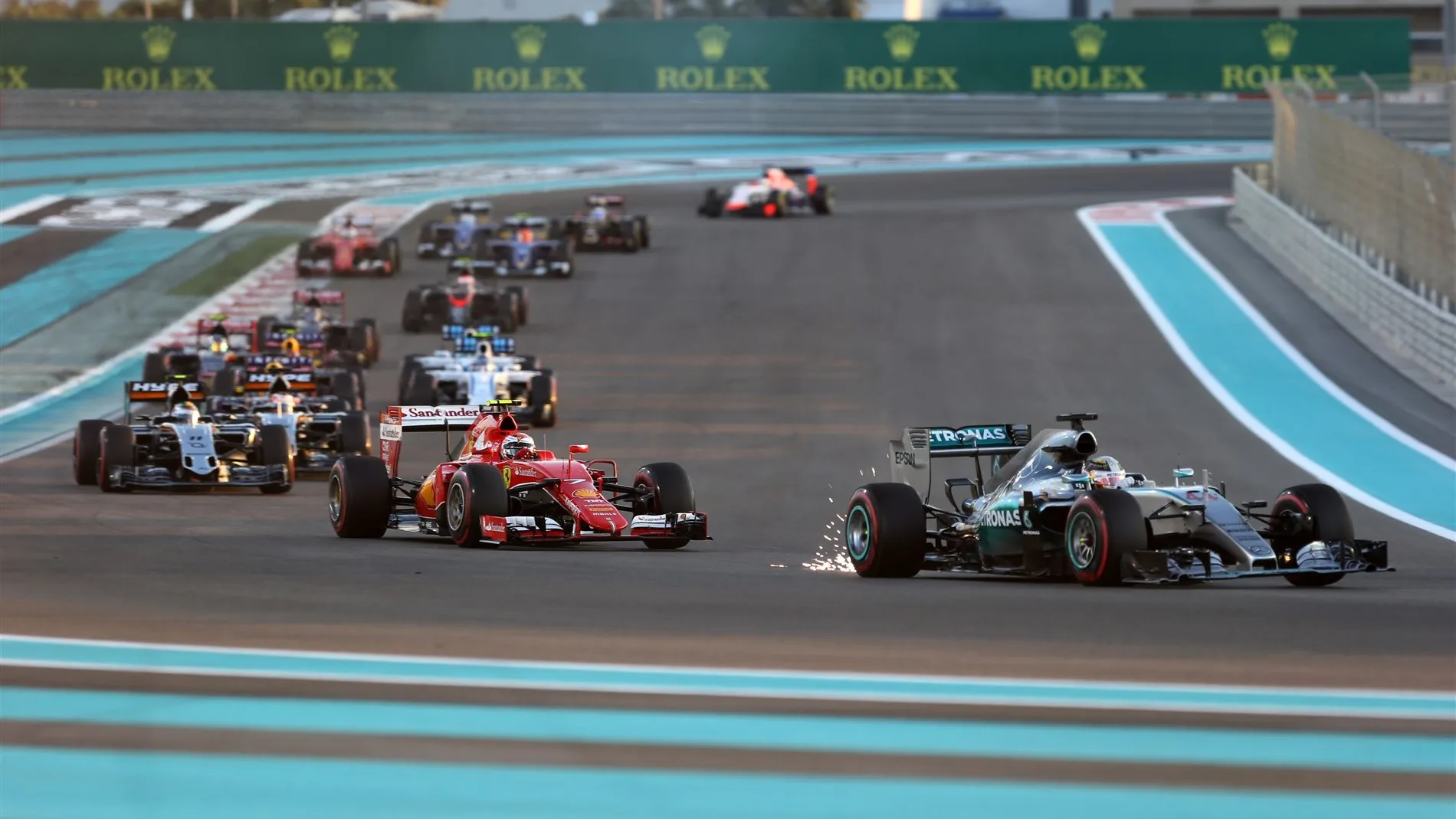 Lewis Hamilton (GBR) Mercedes AMG F1 W06 sparks at the start of the race at Formula One World