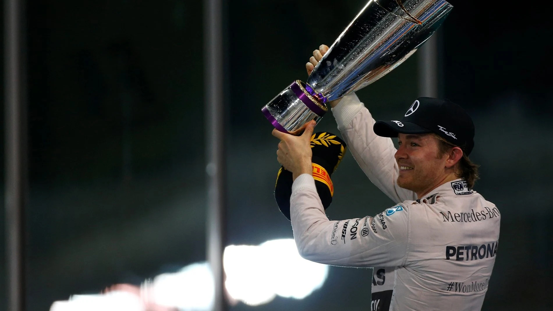 Race winner Nico Rosberg (GER) Mercedes AMG F1 celebrates with the trophy on the podium at Formula
