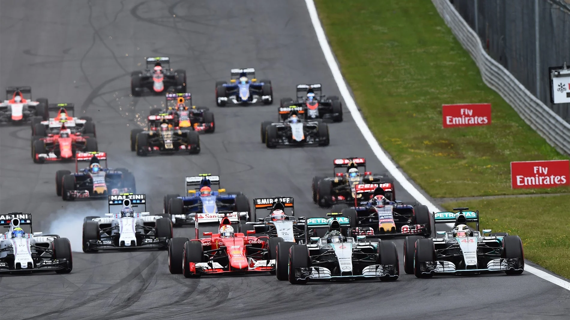 Nico Rosberg (GER) Mercedes AMG F1 W06 leads Lewis Hamilton (GBR) Mercedes AMG F1 W06 at the start of the race at Formula One World Championship, Rd8, Austrian Grand Prix, Race, Spielberg, Austria, Sunday 21 June 2015. © Sutton Motorsport Images
