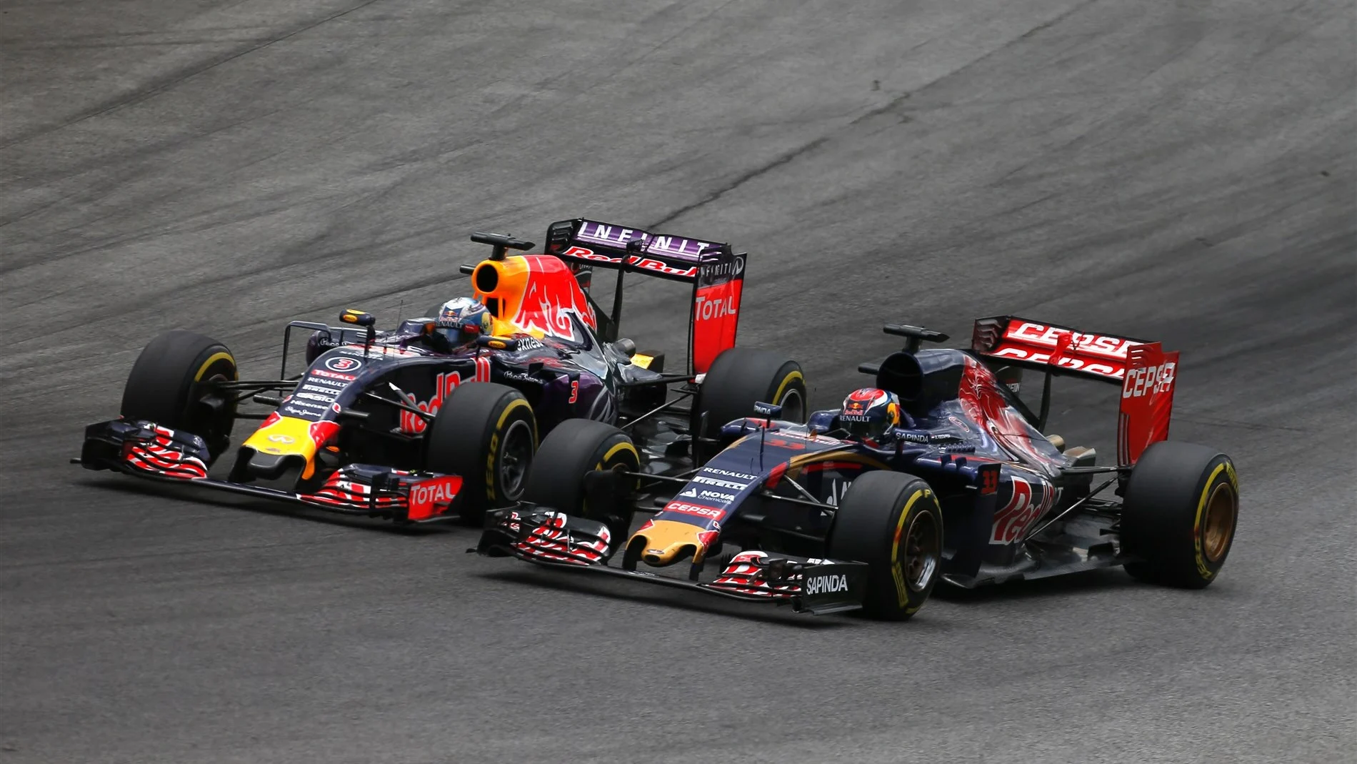 Max Verstappen (NDL) Scuderia Toro Rosso STR10 and Daniel Ricciardo (AUS) Red Bull Racing RB11