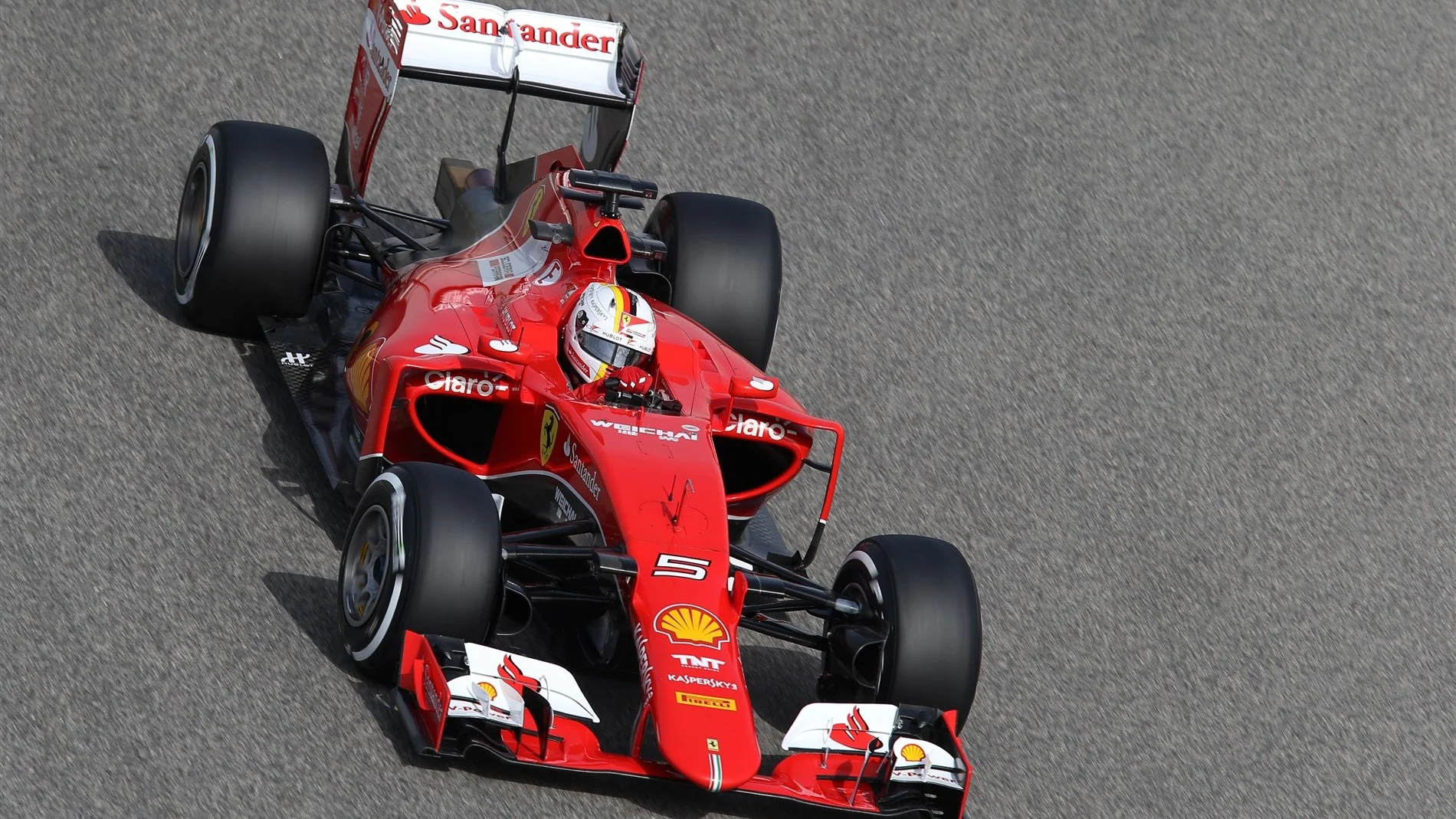 Sebastian Vettel (GER) Ferrari SF15-T at Formula One World Championship, Rd4, Bahrain Grand Prix Practice, Bahrain International Circuit, Sakhir, Bahrain, Friday 17 April 2015. © Sutton Motorsport Images