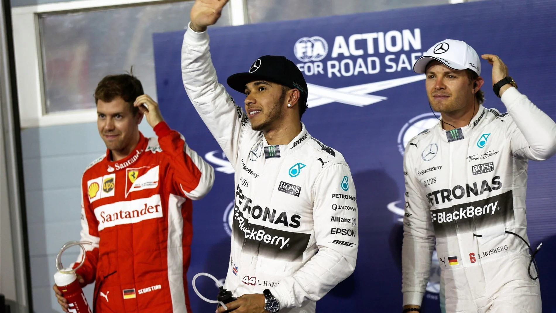(L to R): Sebastian Vettel (GER) Ferrari, pole sitter Lewis Hamilton (GBR) Mercedes AMG F1 and Nico Rosberg (GER) Mercedes AMG F1 celebrate in parc ferme at Formula One World Championship, Rd4, Bahrain Grand Prix Qualifying, Bahrain International Circuit, Sakhir, Bahrain, Saturday 18  April 2015. © Sutton Motorsport Images