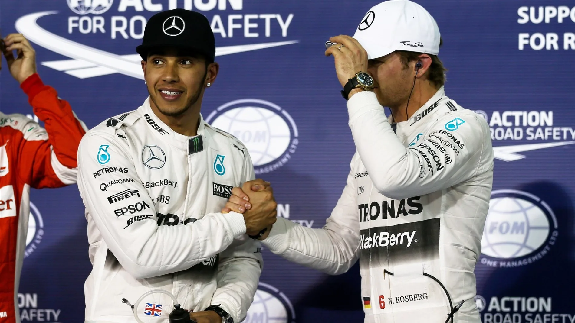 (L to R): Pole sitter Lewis Hamilton (GBR) Mercedes AMG F1 and Nico Rosberg (GER) Mercedes AMG F1 celebrate in parc ferme at Formula One World Championship, Rd4, Bahrain Grand Prix Qualifying, Bahrain International Circuit, Sakhir, Bahrain, Saturday 18  April 2015. © Sutton Motorsport Images