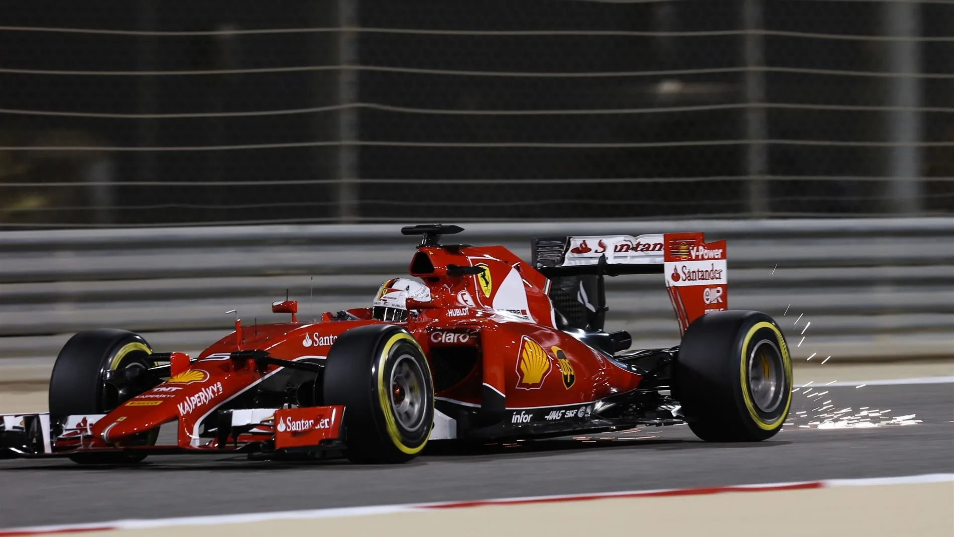 Sebastian Vettel (GER) Ferrari SF15-T sparks at Formula One World Championship, Rd4, Bahrain Grand
