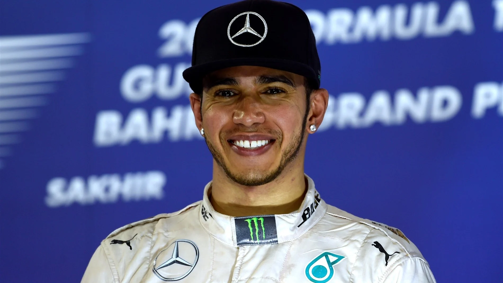 Race winner Lewis Hamilton (GBR) Mercedes AMG F1 celebrates on the podium at Formula One World Championship, Rd4, Bahrain Grand Prix Race, Bahrain International Circuit, Sakhir, Bahrain, Sunday 19  April 2015. © Sutton Motorsport Images