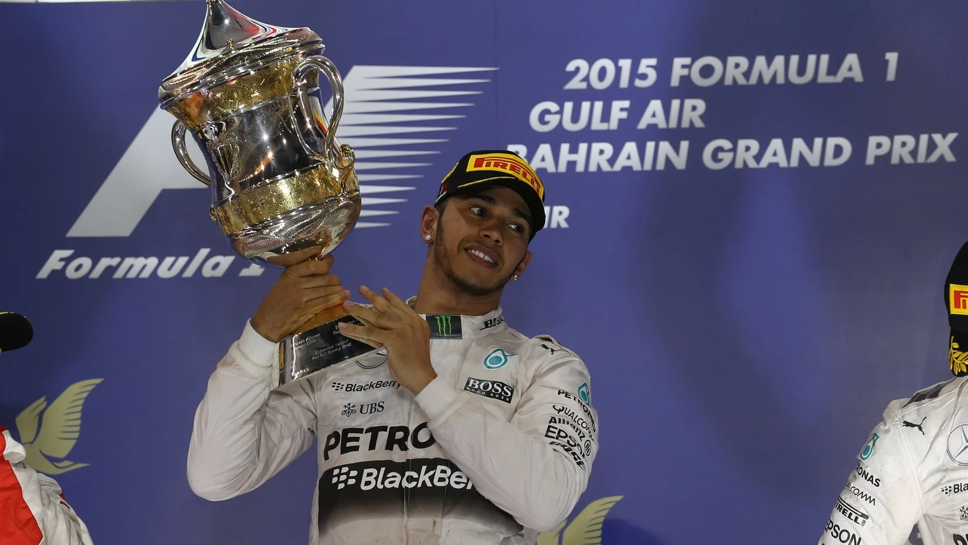 Race winner Lewis Hamilton (GBR) Mercedes AMG F1 celebrates with his trophy on the podium at Formula One World Championship, Rd4, Bahrain Grand Prix Race, Bahrain International Circuit, Sakhir, Bahrain, Sunday 19  April 2015. © Sutton Motorsport Images